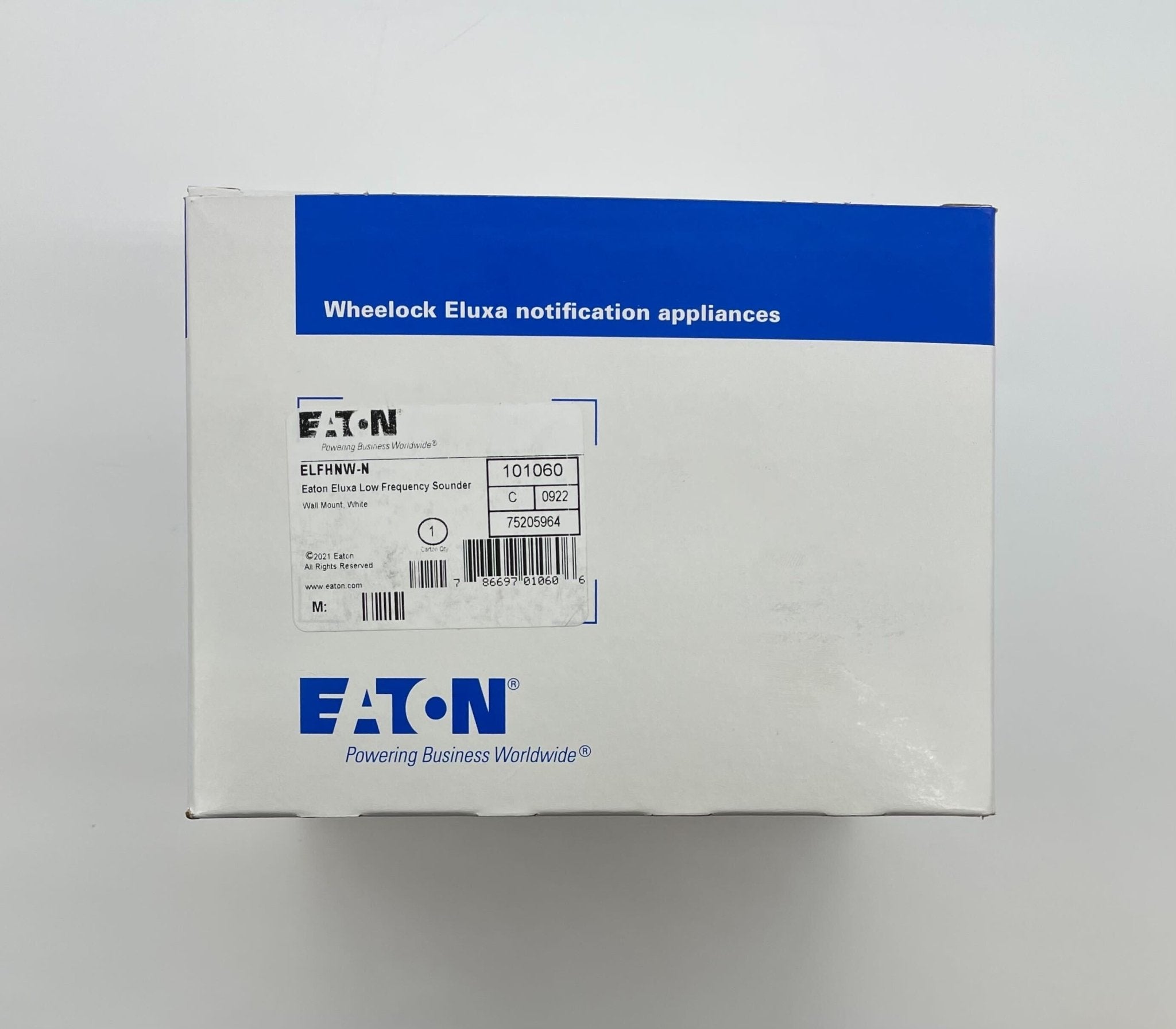 Eaton Wheelock ELFHNW-N horn strobe alarm device with black housing and mounting bracket for fire safety systems
