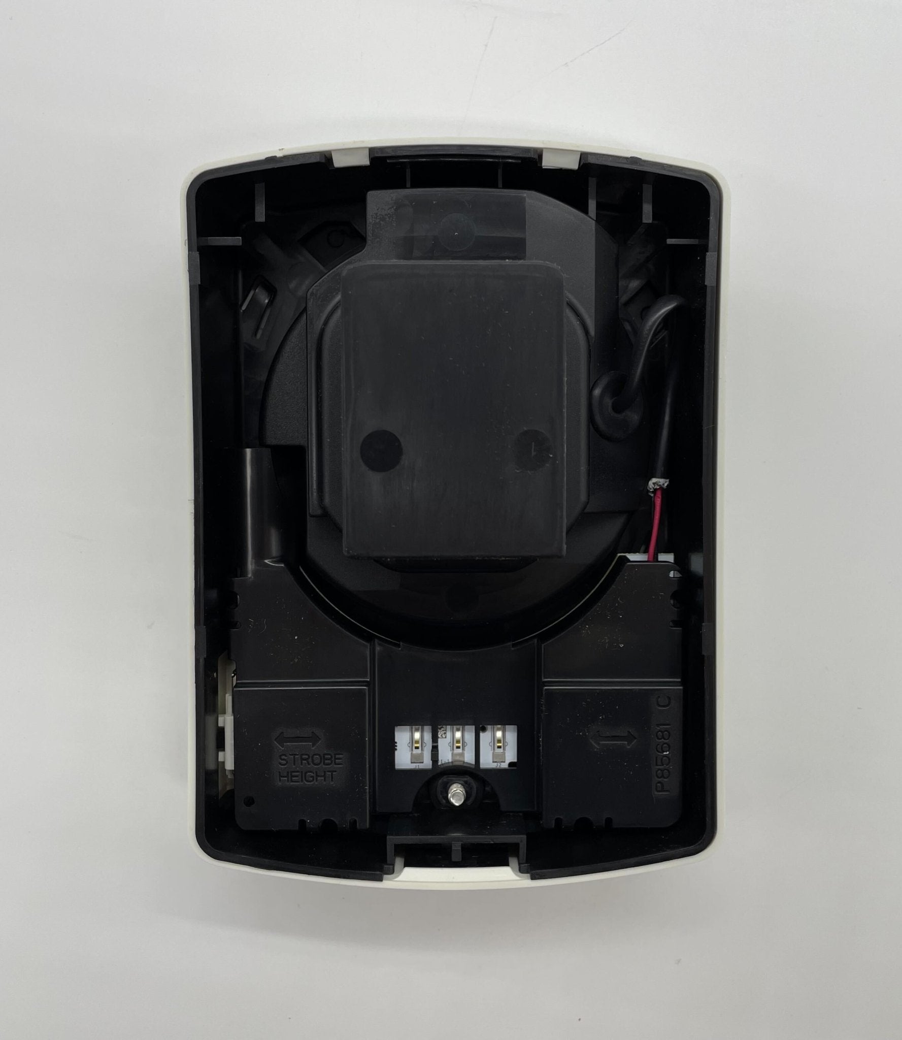 Eaton Wheelock ELFHNW-N horn strobe alarm device with yellow housing and mounting bracket for fire safety systems