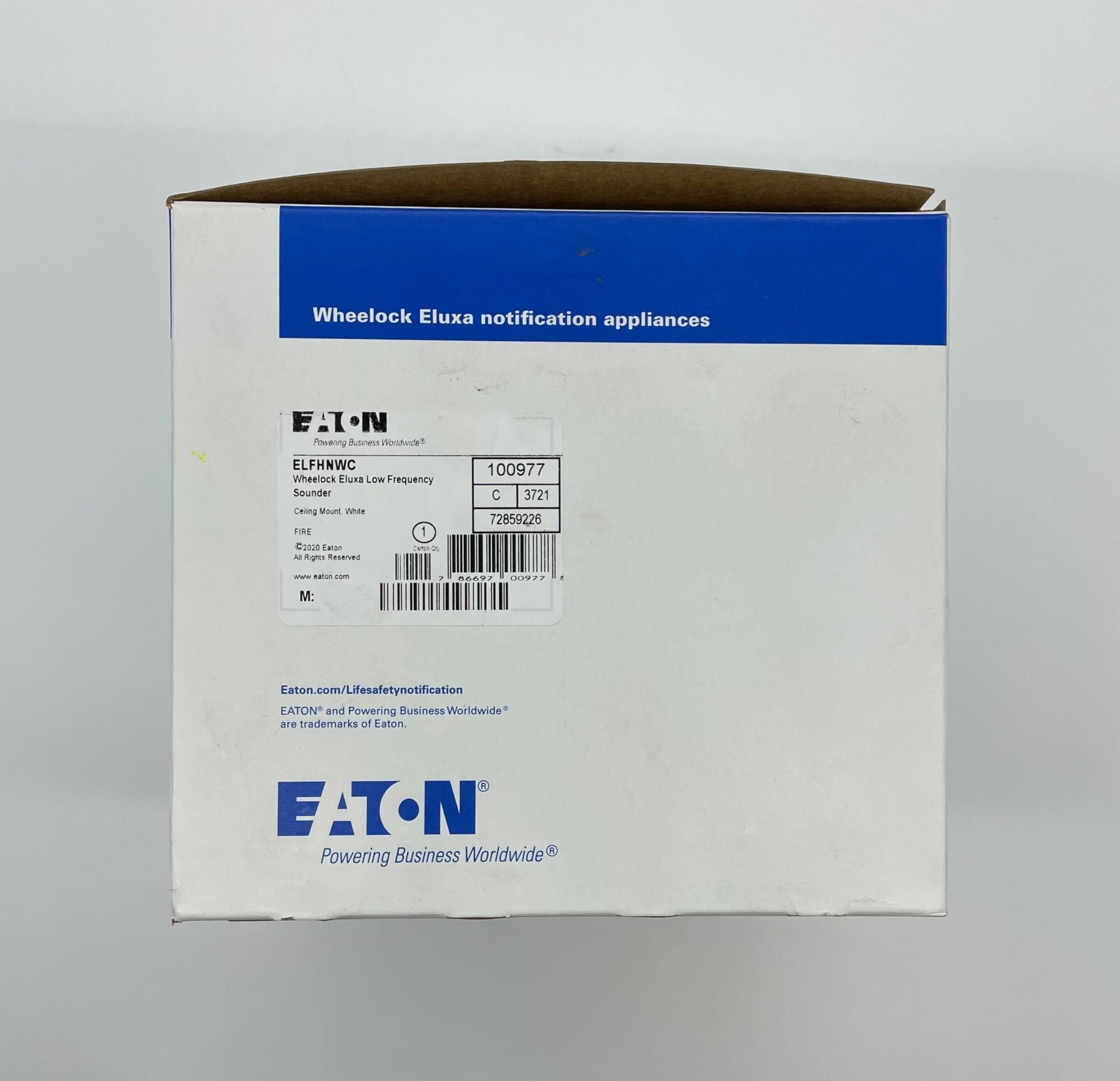 Eaton Wheelock ELFHNWC horn with black finish, mounted on a white background, designed for industrial signaling and alert systems.