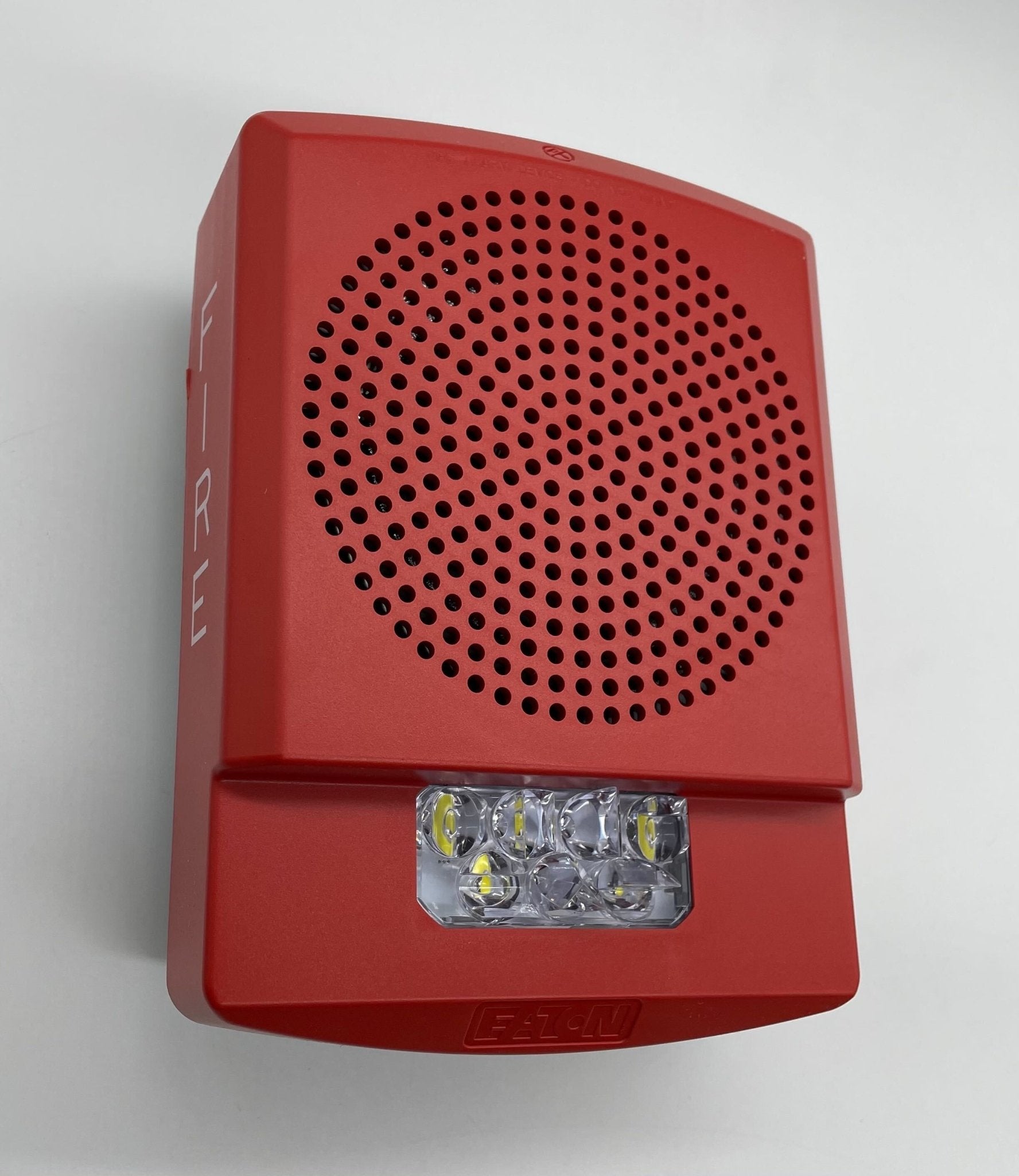 Eaton Wheelock ELFHSR emergency signaling strobe light mounted on a device with a clear view of the product label.