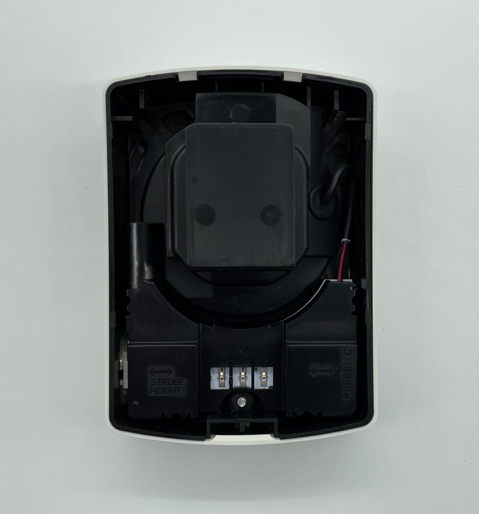Eaton Wheelock ELFHSW-CO strobe light with a clear lens and mounting bracket on a white background