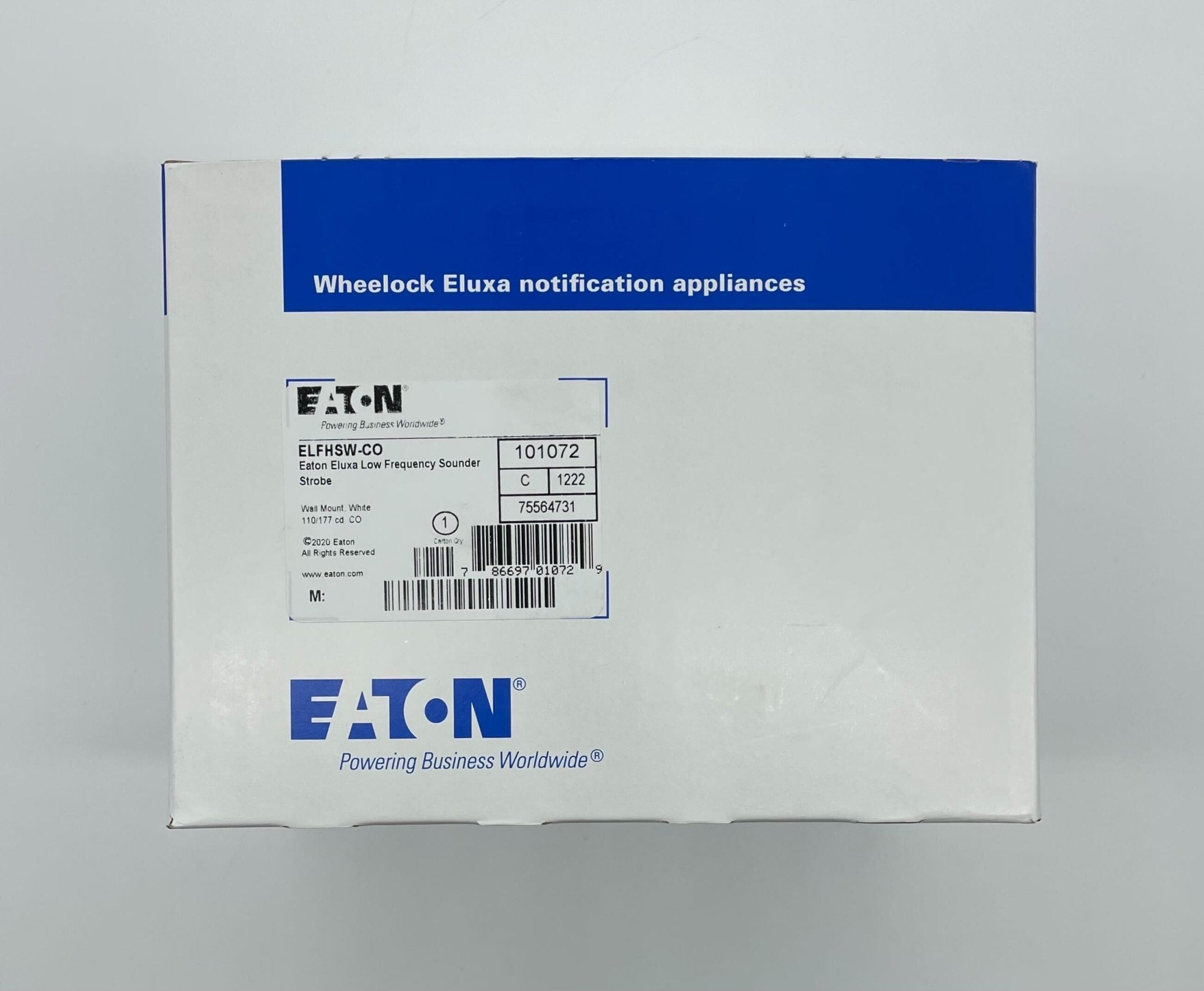 Eaton Wheelock ELFHSW-CO strobe light with red lens, mounted on a ceiling, used for emergency signaling and alert systems.