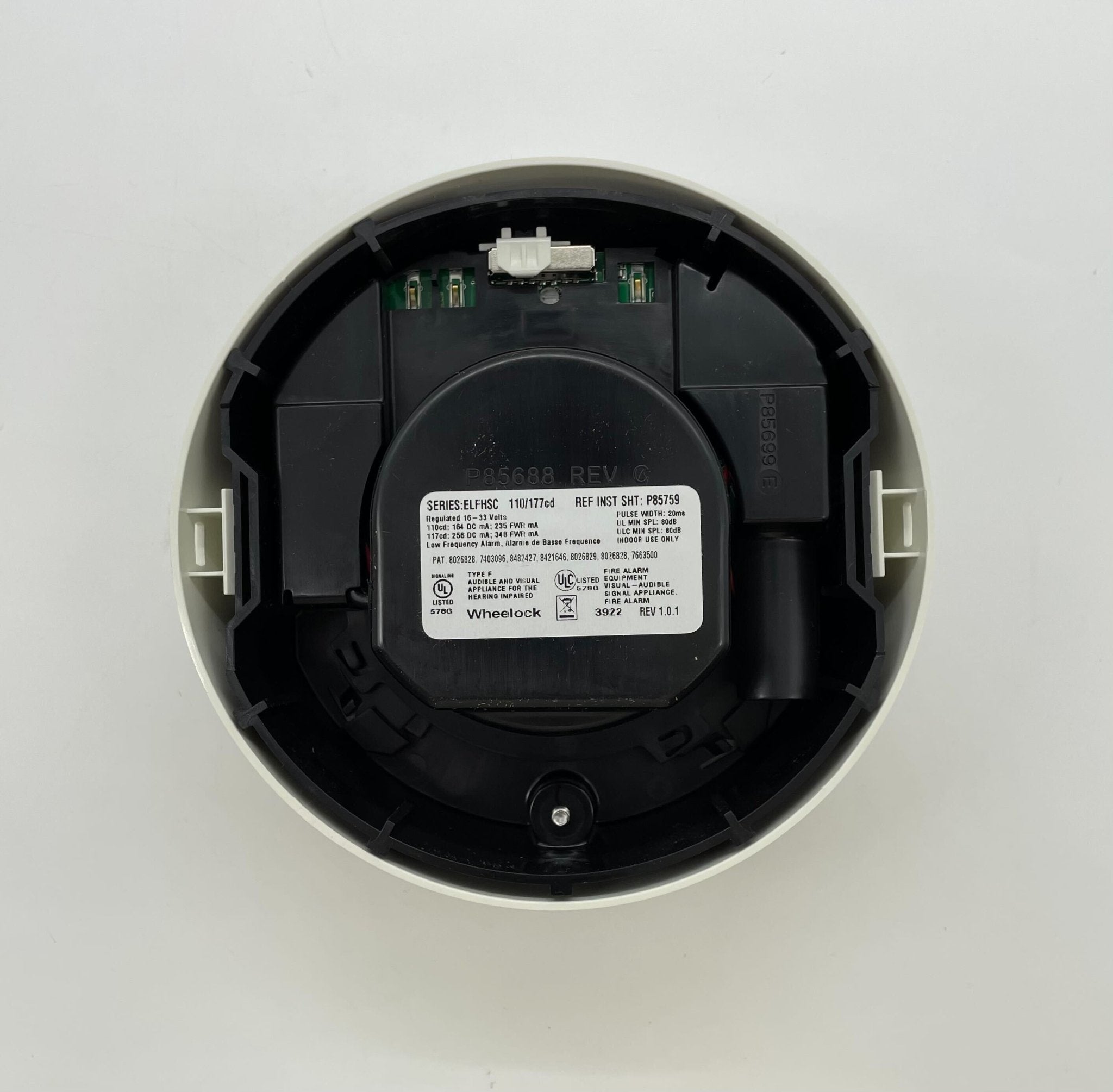 Eaton Wheelock ELFHSWC emergency lighting fixture mounted on a ceiling, designed for commercial safety applications