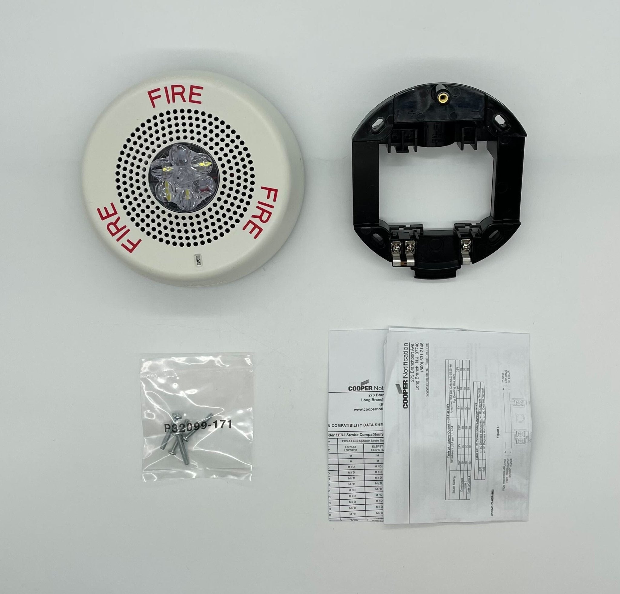 Eaton Wheelock ELFHSWC LED emergency lighting fixture with metal enclosure mounted on a wall in a building.