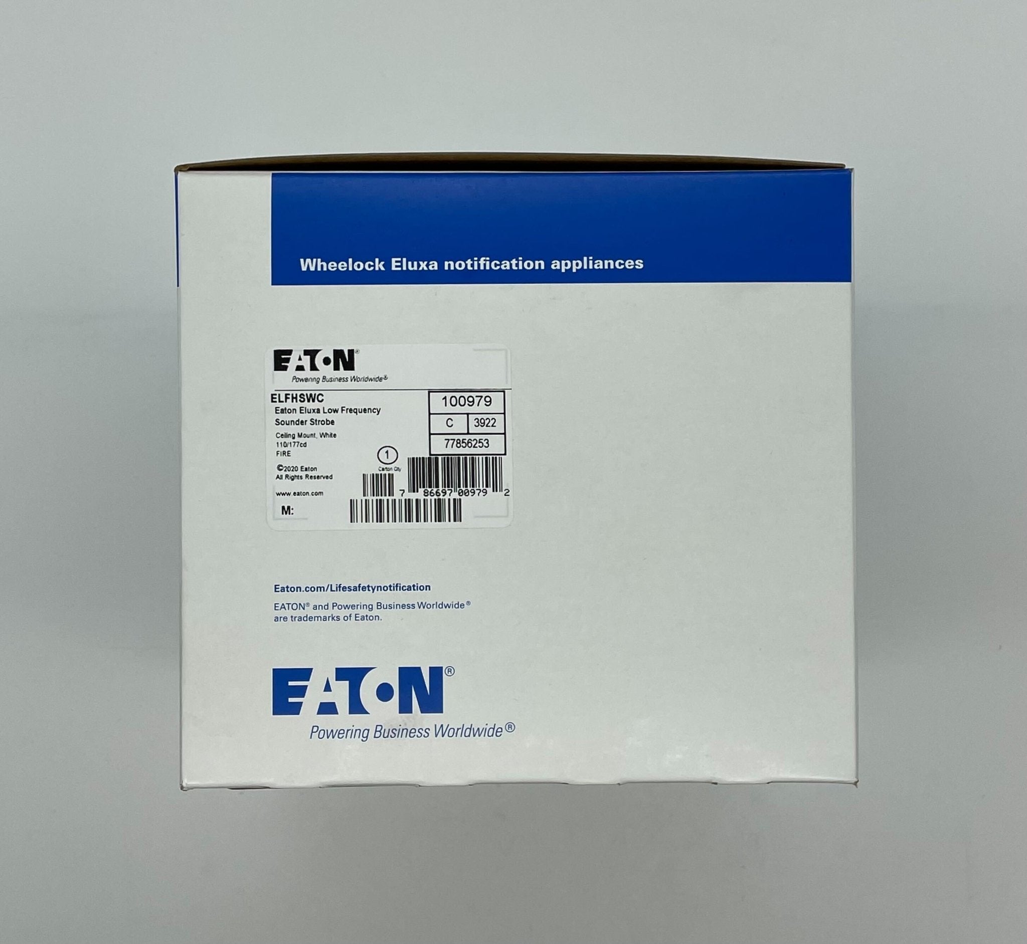 Eaton Wheelock ELFHSWC emergency lighting fixture with LED lamp, mounted on a ceiling in a commercial setting