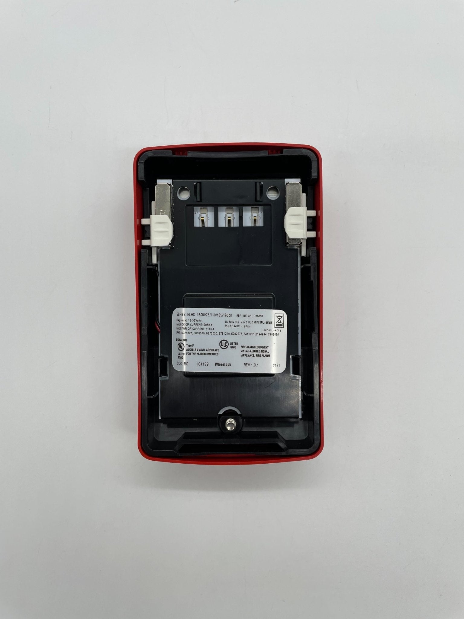 Eaton Wheelock ELHSR horn strobe alarm with red horn and clear lens, mounted on a white wall for emergency alert signaling.