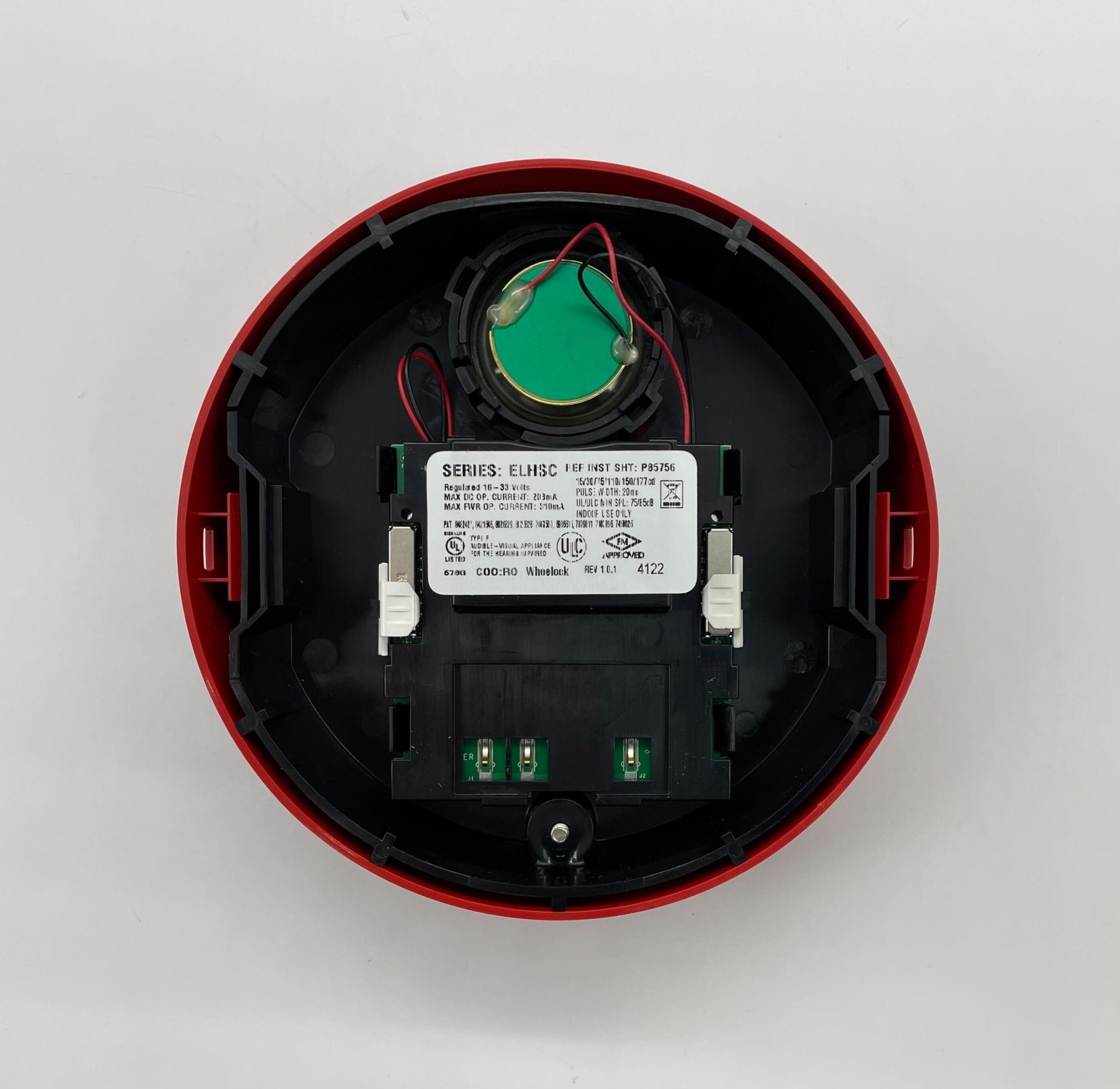 Eaton Wheelock ELHSRC horn strobe alarm device mounted on a wall, designed for fire alarm systems and safety alerts.