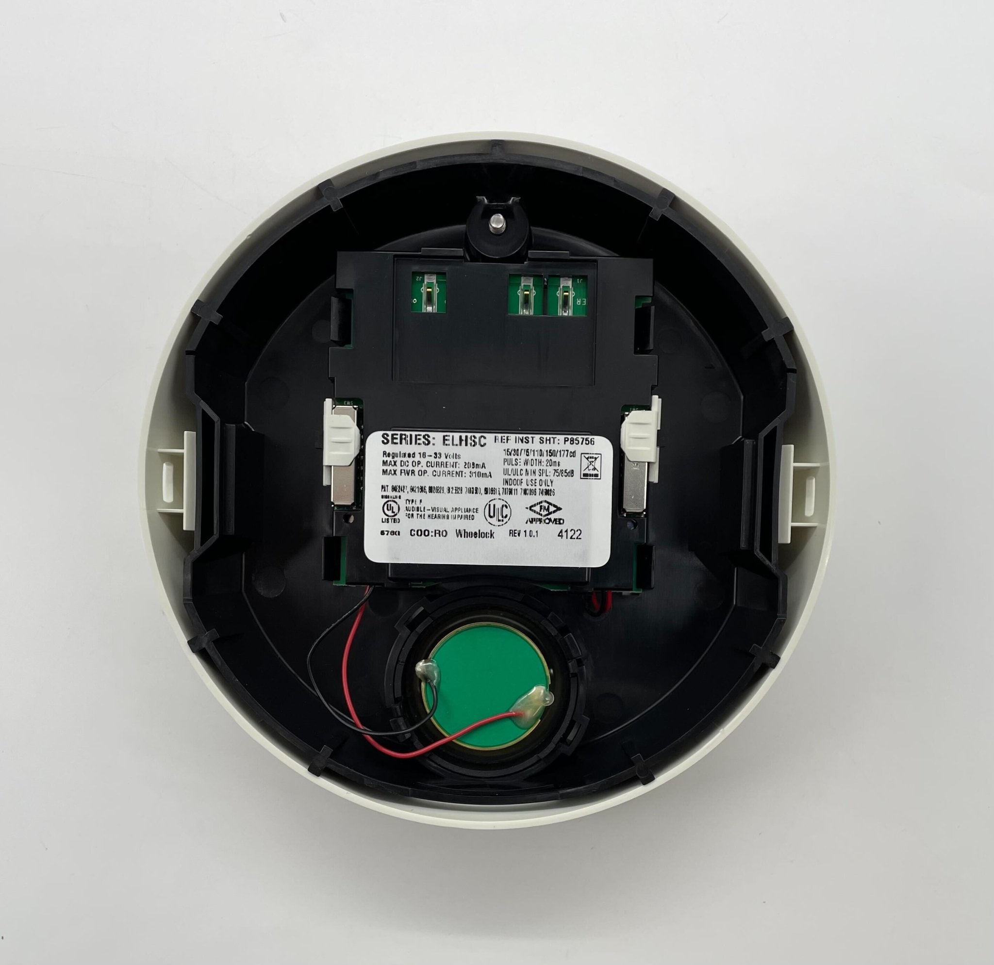 Eaton Wheelock ELHSWC horn strobe light with red housing and mounting base for fire alarm signaling.