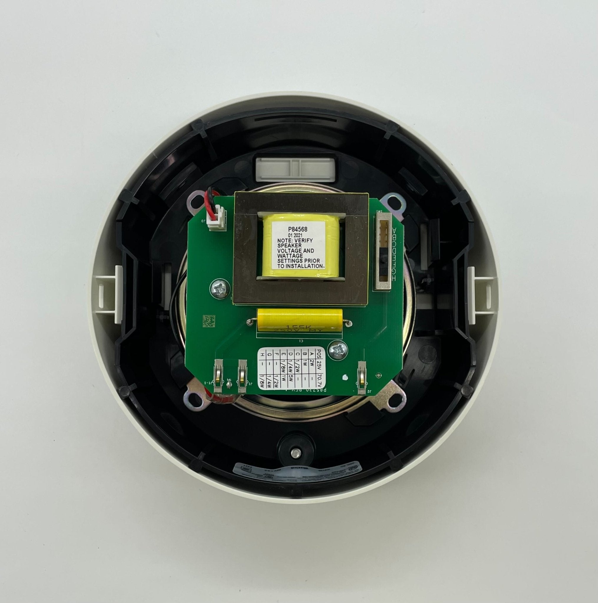 Eaton Wheelock ELSPKWC speaker with black grille and mounting bracket, designed for commercial or public address systems.