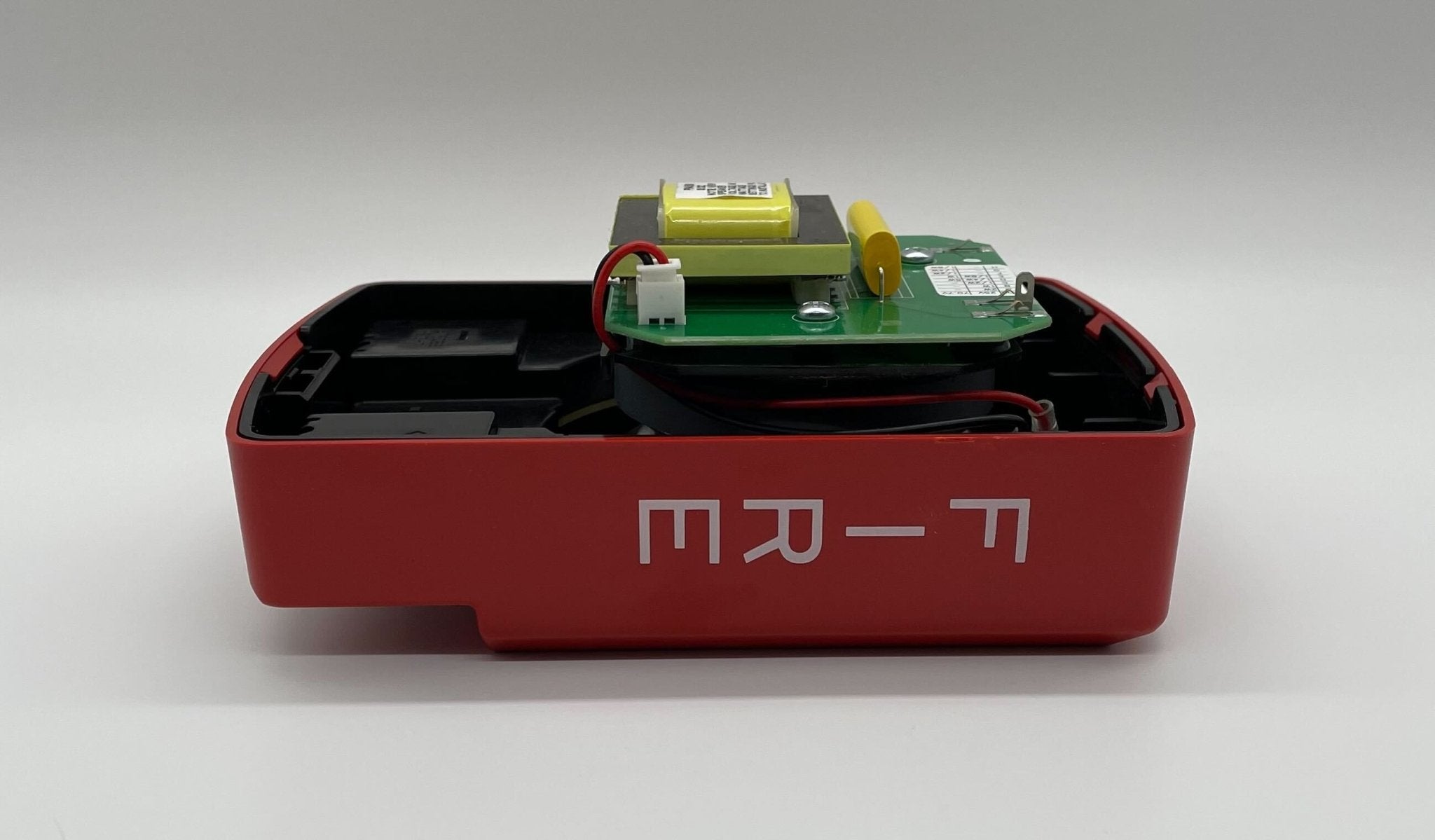 Eaton Wheelock ELSPSTR speaker strobe light with red lens and mounting hardware, used for emergency notification systems.