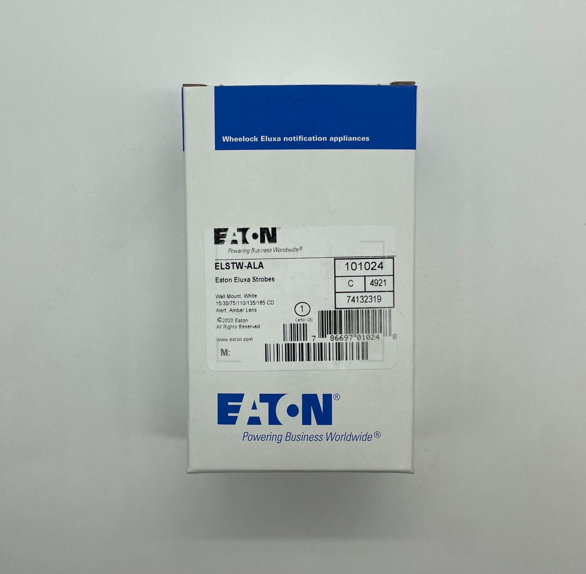 Eaton Wheelock ELSTW-ALA strobe light with white lens and mounting base, designed for emergency and warning applications