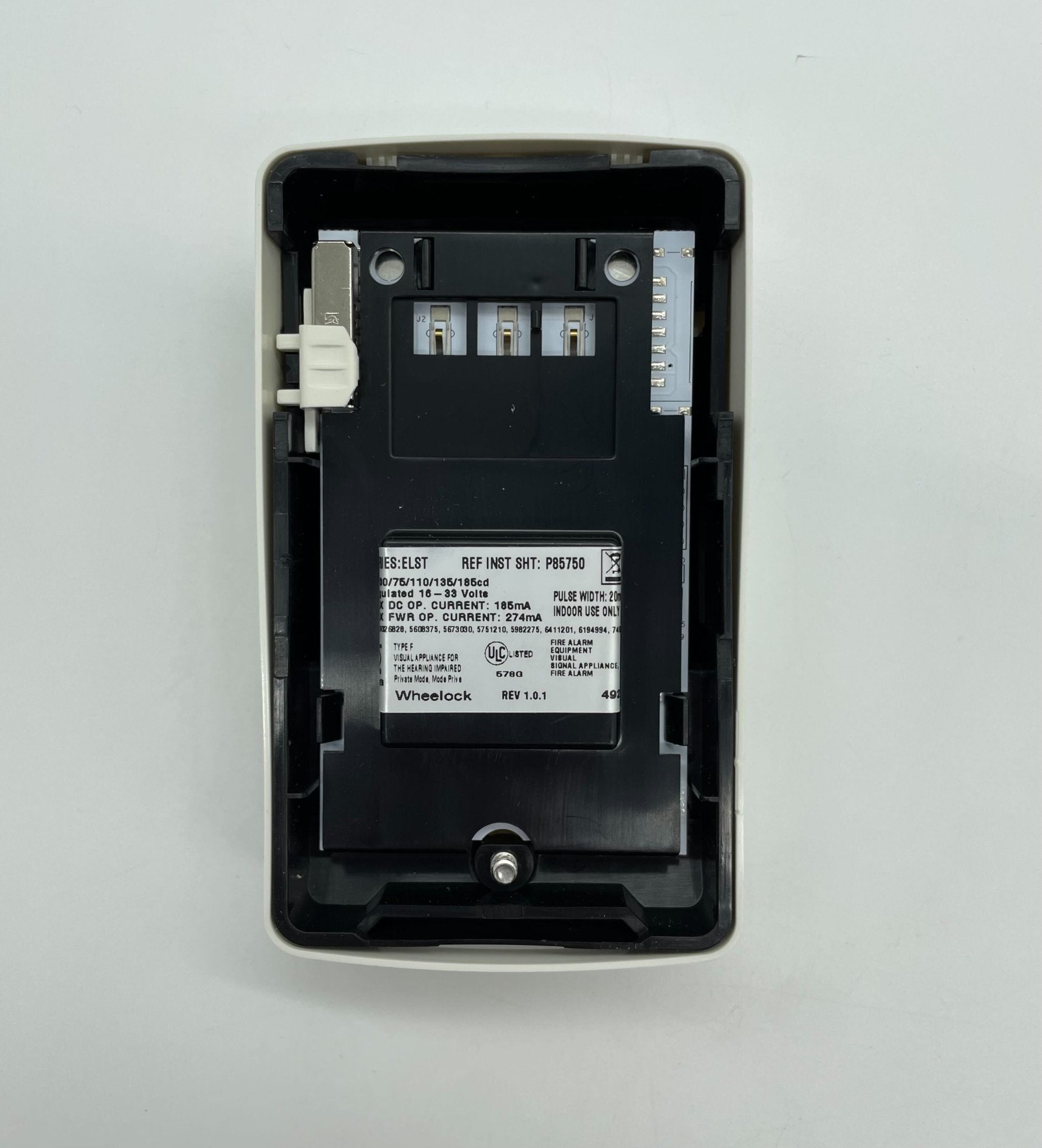 Eaton Wheelock ELSTW-ALA strobe light with clear lens and mounting bracket, designed for emergency signaling and alert systems.