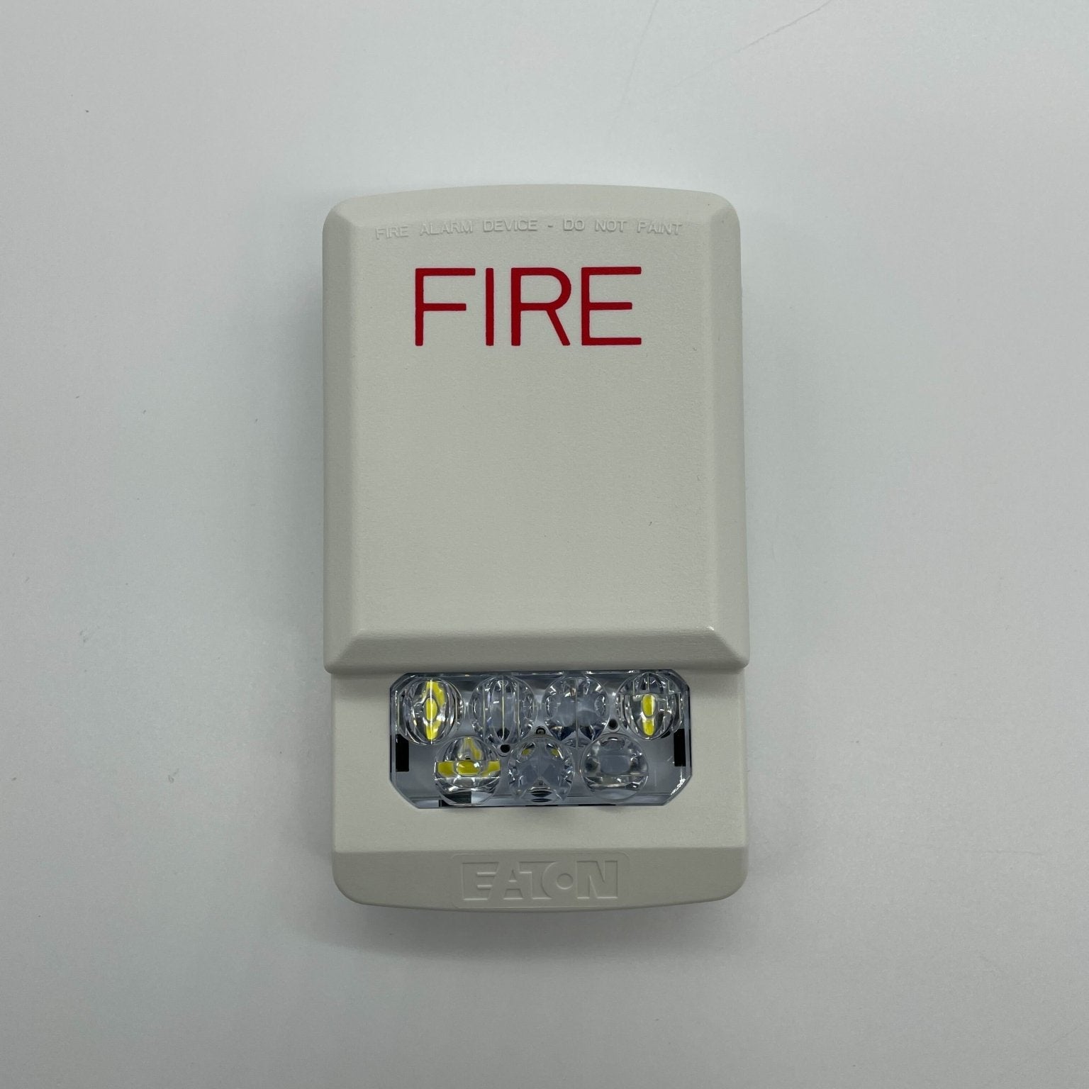 Eaton Wheelock ELSTW strobe light with Jem Systems Canada label, mounted on a panel, designed for emergency signaling.