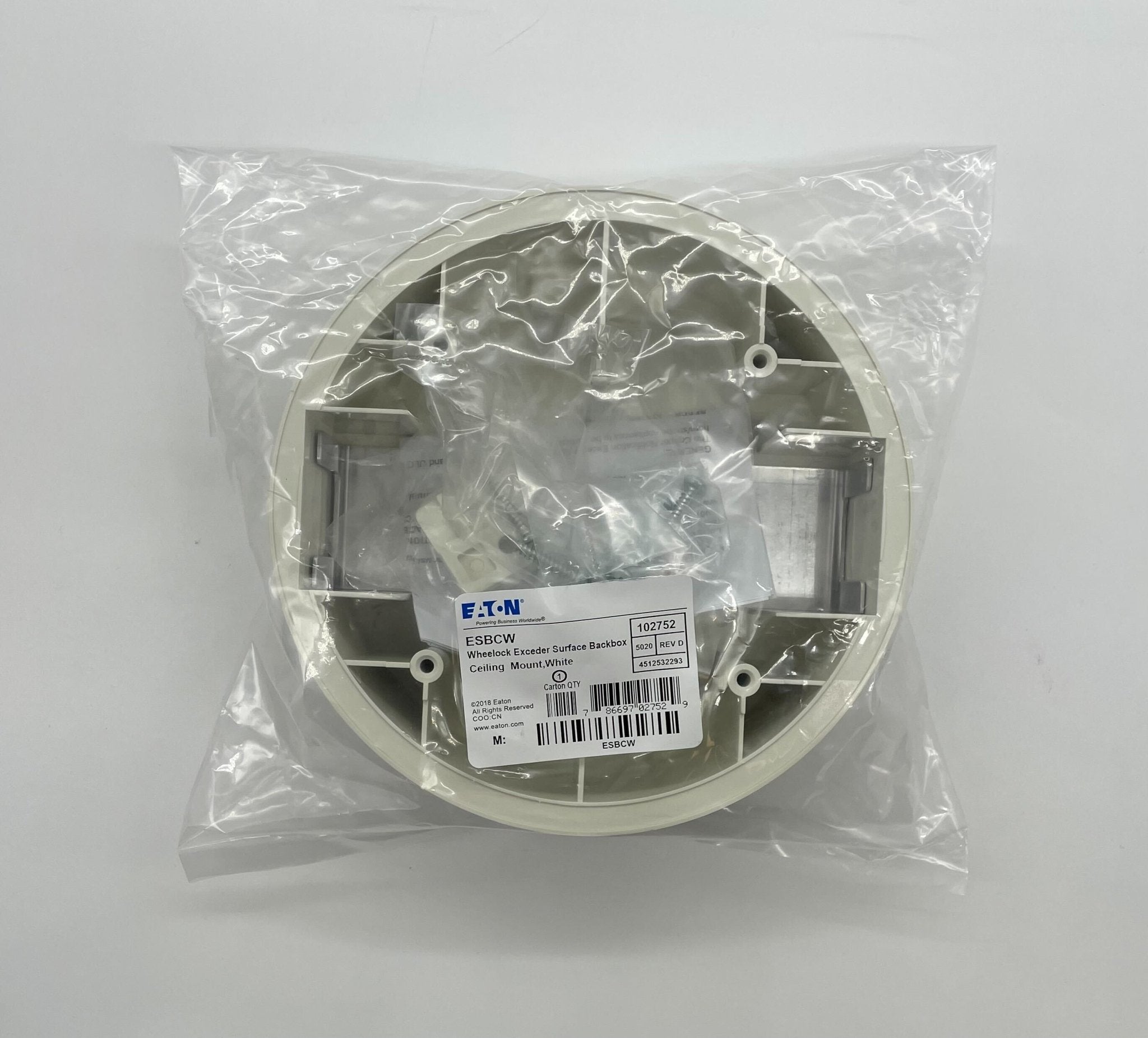 Eaton Wheelock ESBCW fire alarm with black casing and mounting bracket, designed for building safety alert systems