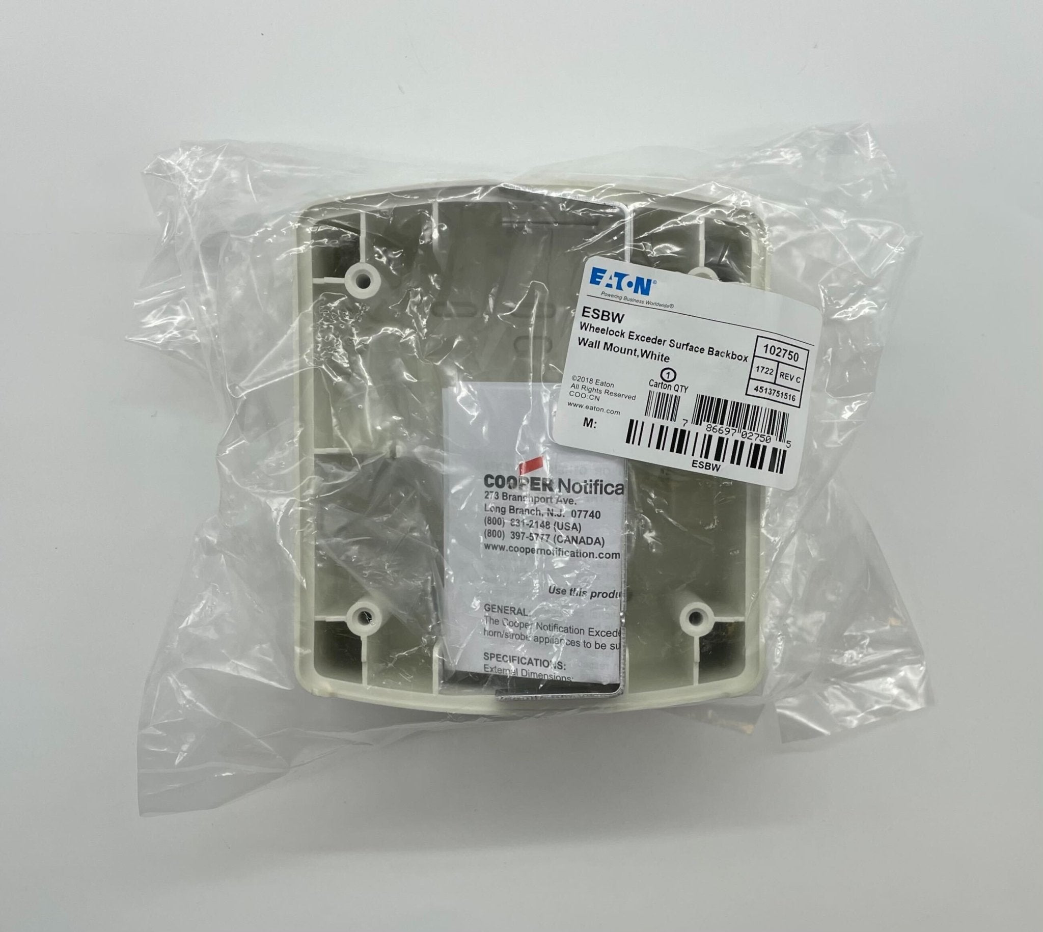 Eaton Wheelock ESBW fire alarm with audible and visual signaling device, mounted on a wall for fire safety alert.