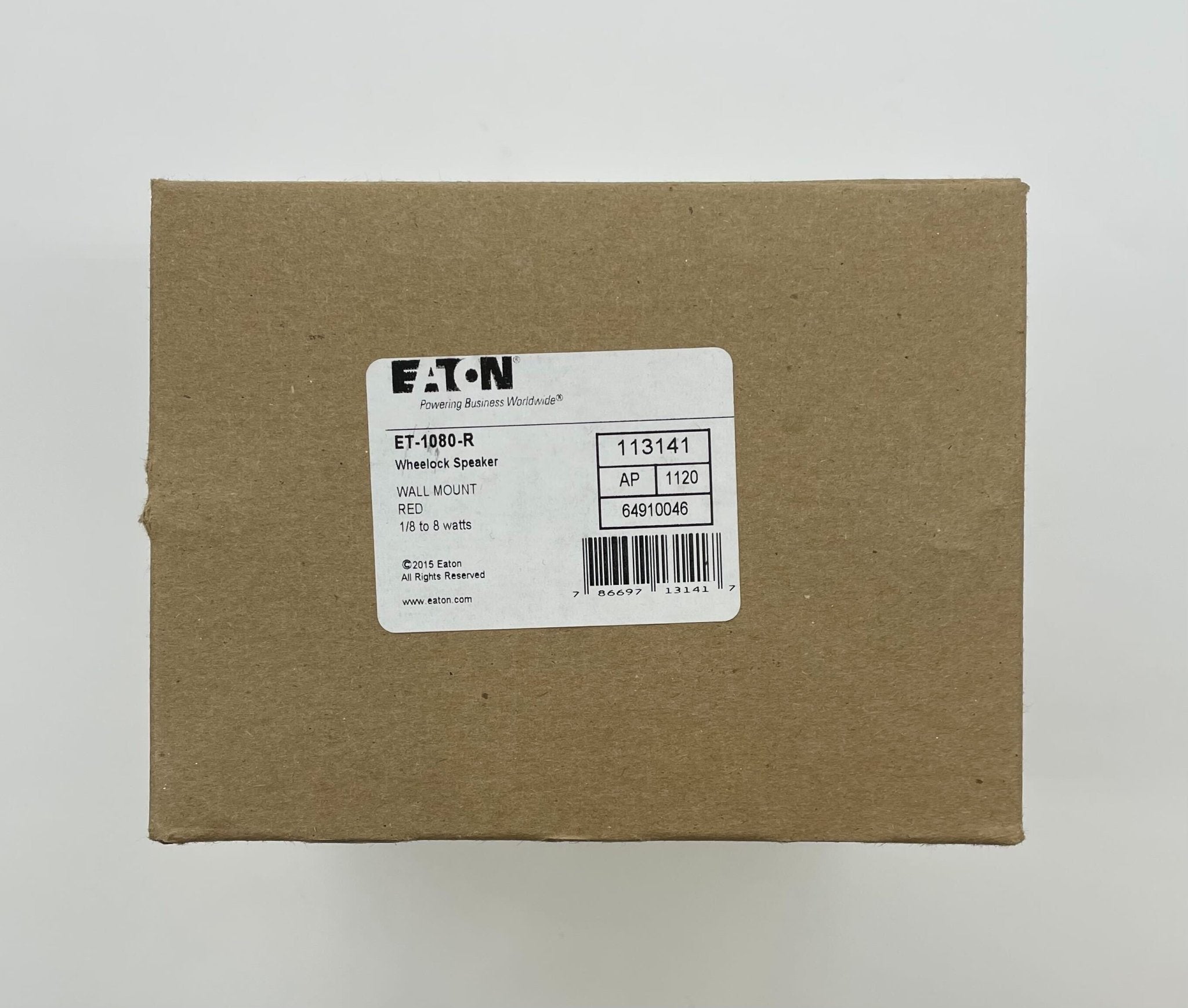 Eaton Wheelock ET-1080-R speaker mounted on wall, black enclosure, designed for commercial audio applications.