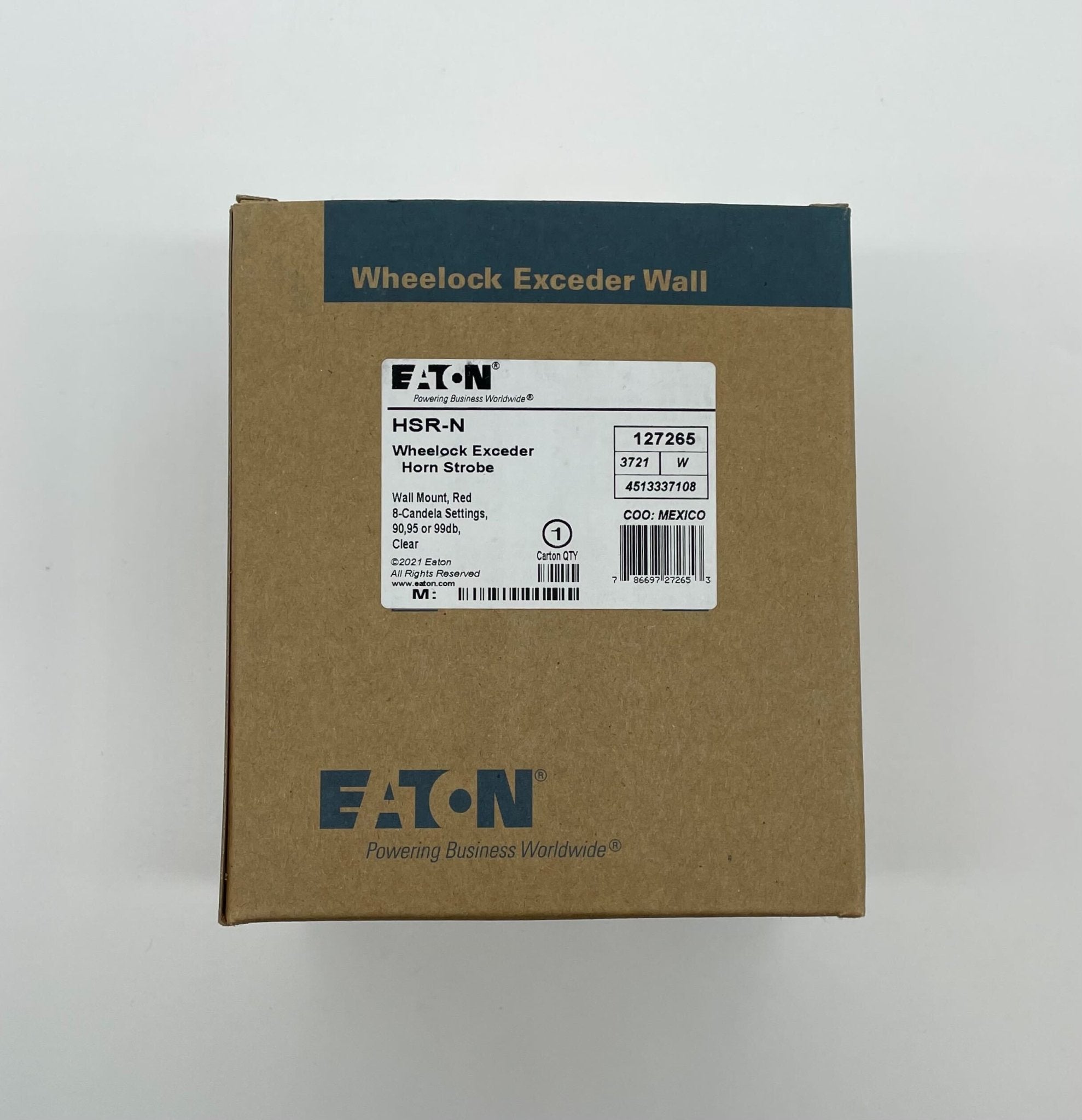 Eaton Wheelock HSR-N horn strobe alert device with red horn and clear lens, mounted on a wall for fire safety signaling.