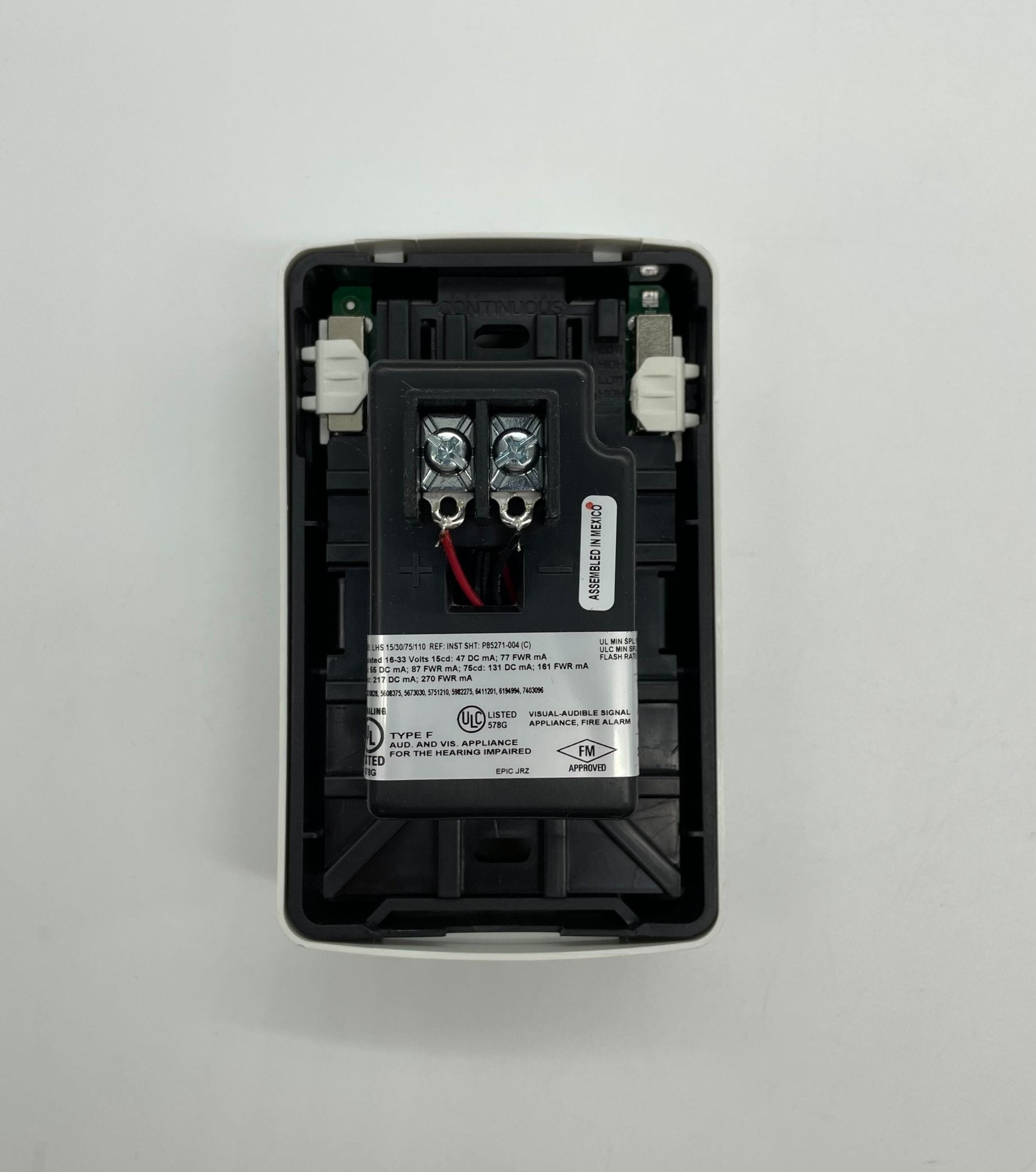 Eaton Wheelock LHSW horn strobe alarm with red horn and clear lens, mounted on a white wall.