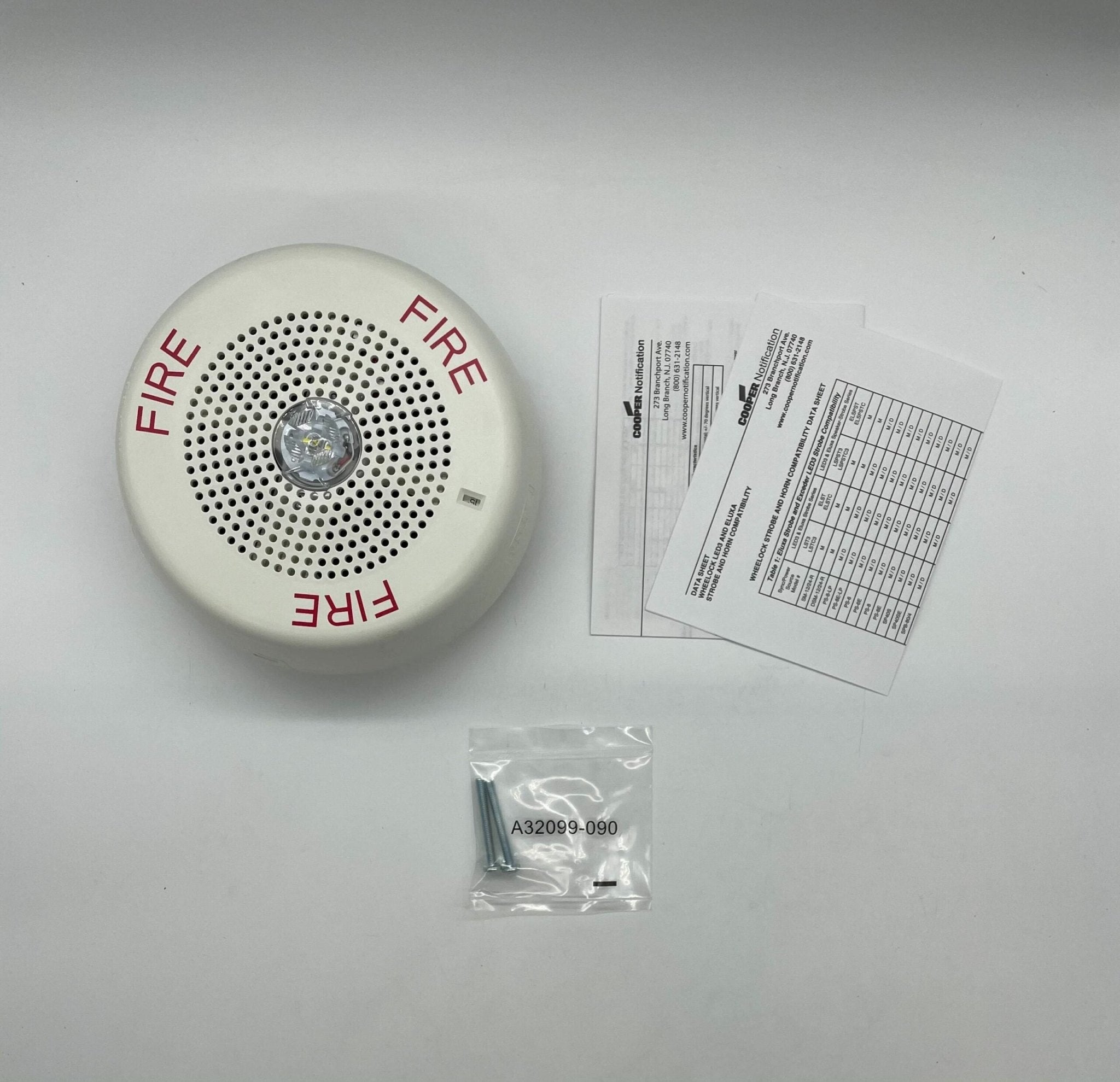 Eaton Wheelock LSPSTWC3 speaker strobe light in white, mounted on wall, for fire alarm signaling and emergency alerts.