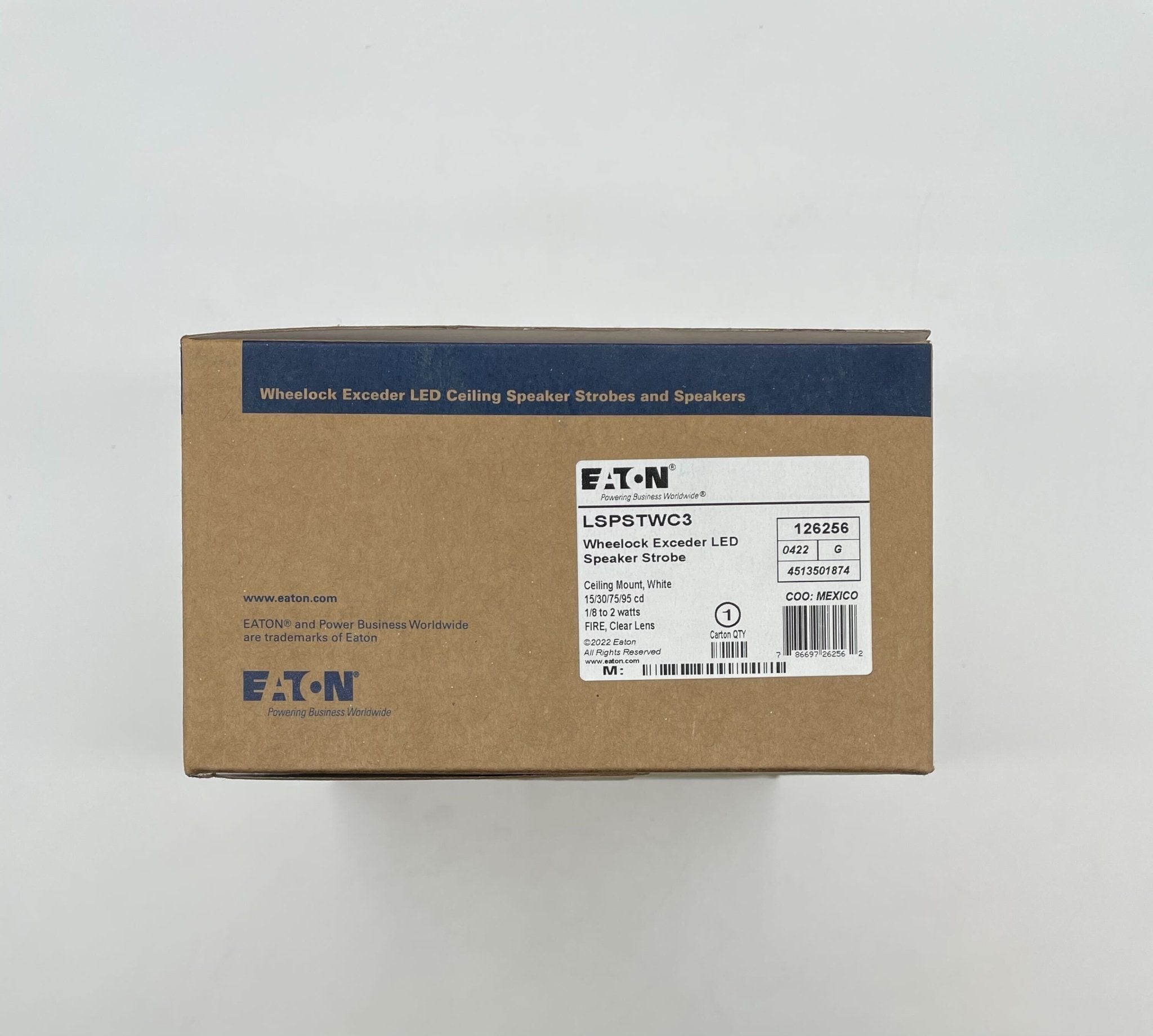 Eaton Wheelock LSPSTWC3 speaker strobe light with white housing and clear lens, mounted on wall for emergency alert signaling