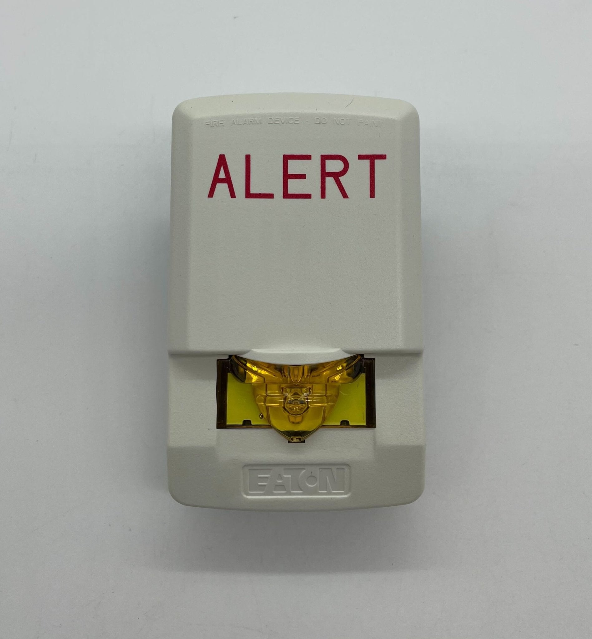 Eaton Wheelock LSTW3-ALA strobe light with clear lens and mounting base, designed for warning and signaling applications