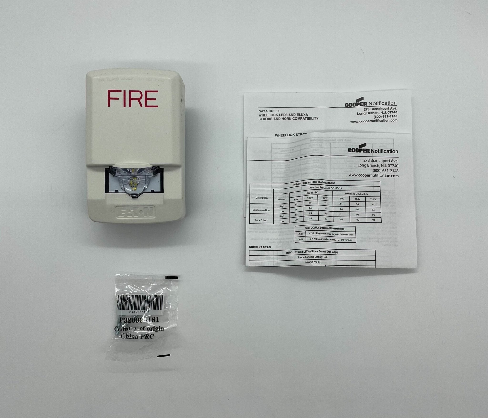 Eaton Wheelock LSTW3 strobe light with clear lens and mounting hardware for visual signaling and safety alerts.