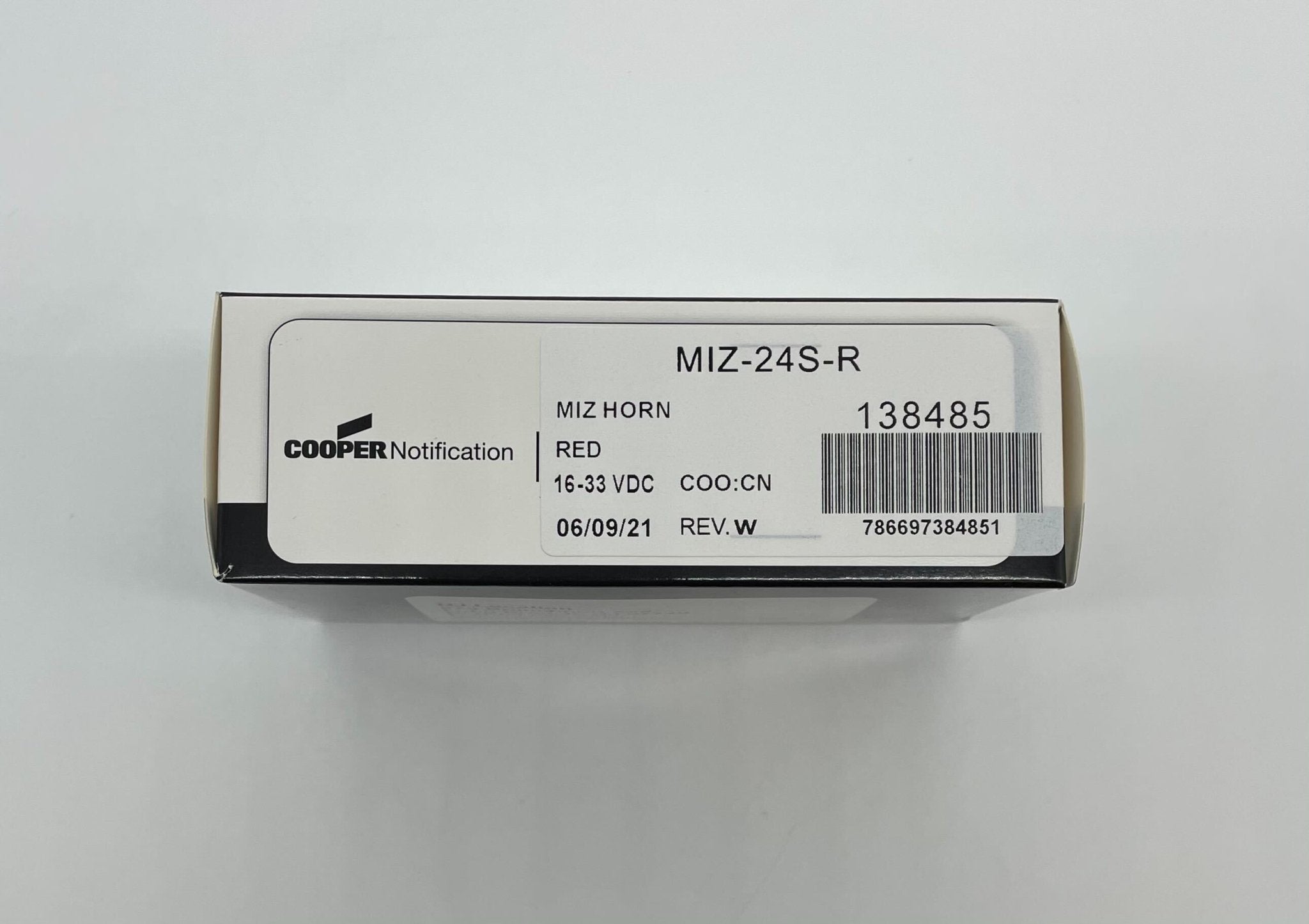 Eaton Wheelock MIZ-24S-R horn with metal mounting bracket and wiring for industrial alert systems.