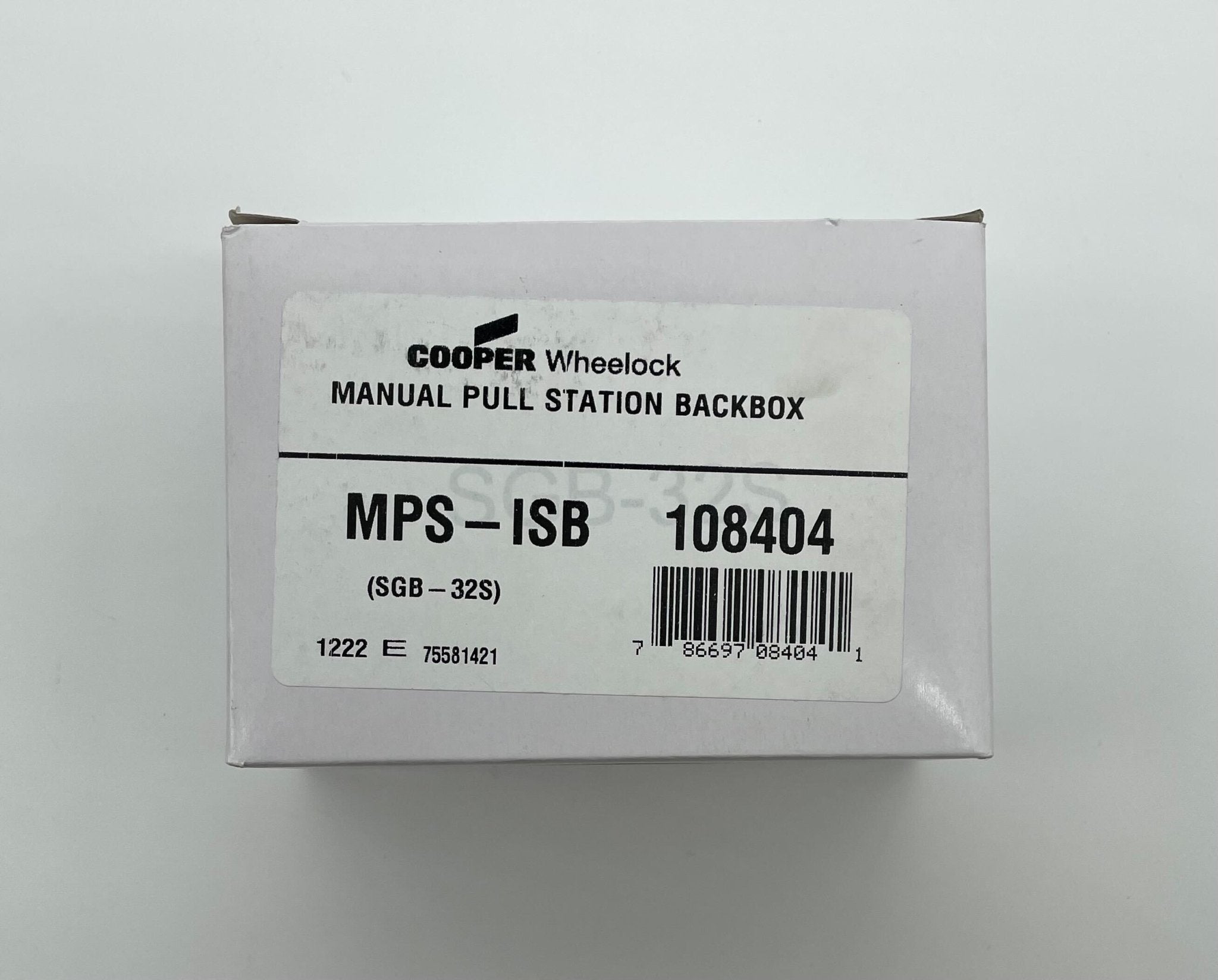 Eaton Wheelock MPS-ISB pull station with black cover and metal frame, mounted on wall for emergency alarm activation.