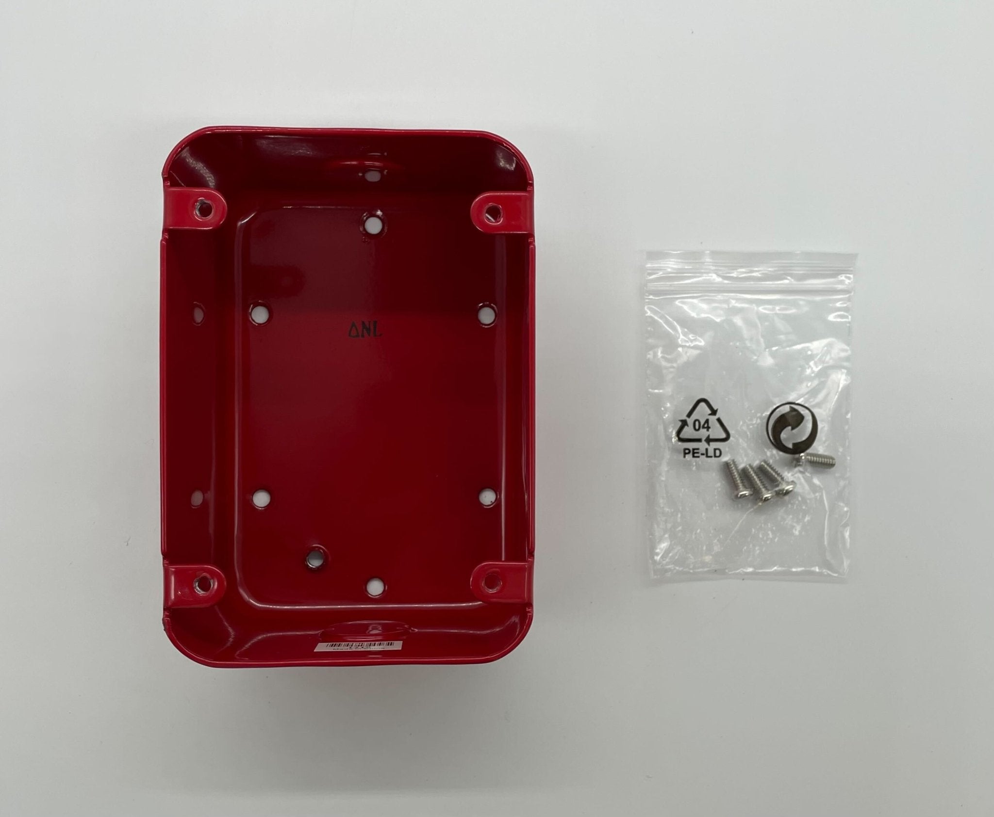 Eaton Wheelock MPS-ISB pull station for fire alarm systems, mounted on wall with clear label and safety glass cover.