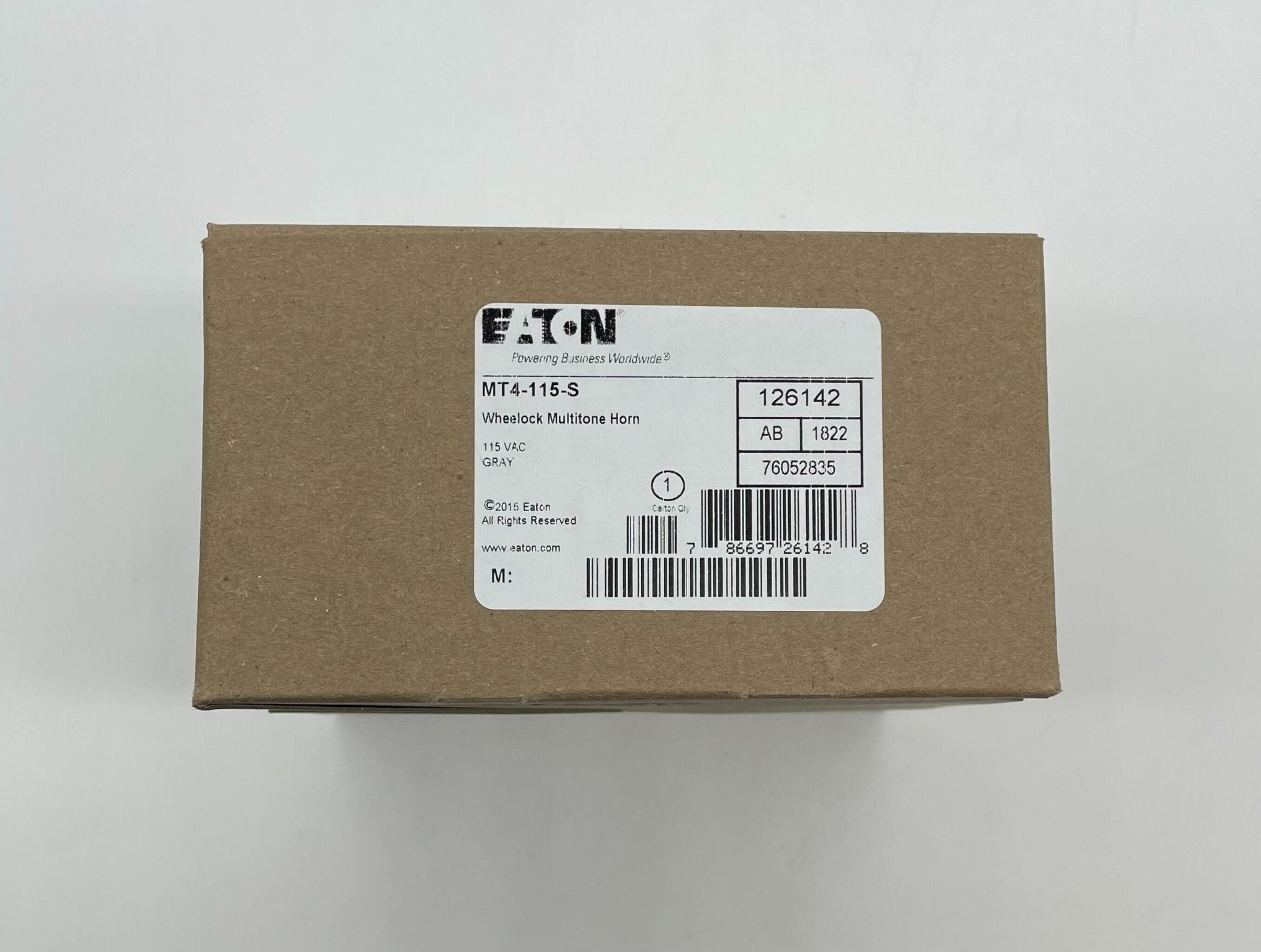 Eaton Wheelock MT4-115-S fire alarm with metal mounting base and wiring terminals, designed for fire detection systems.