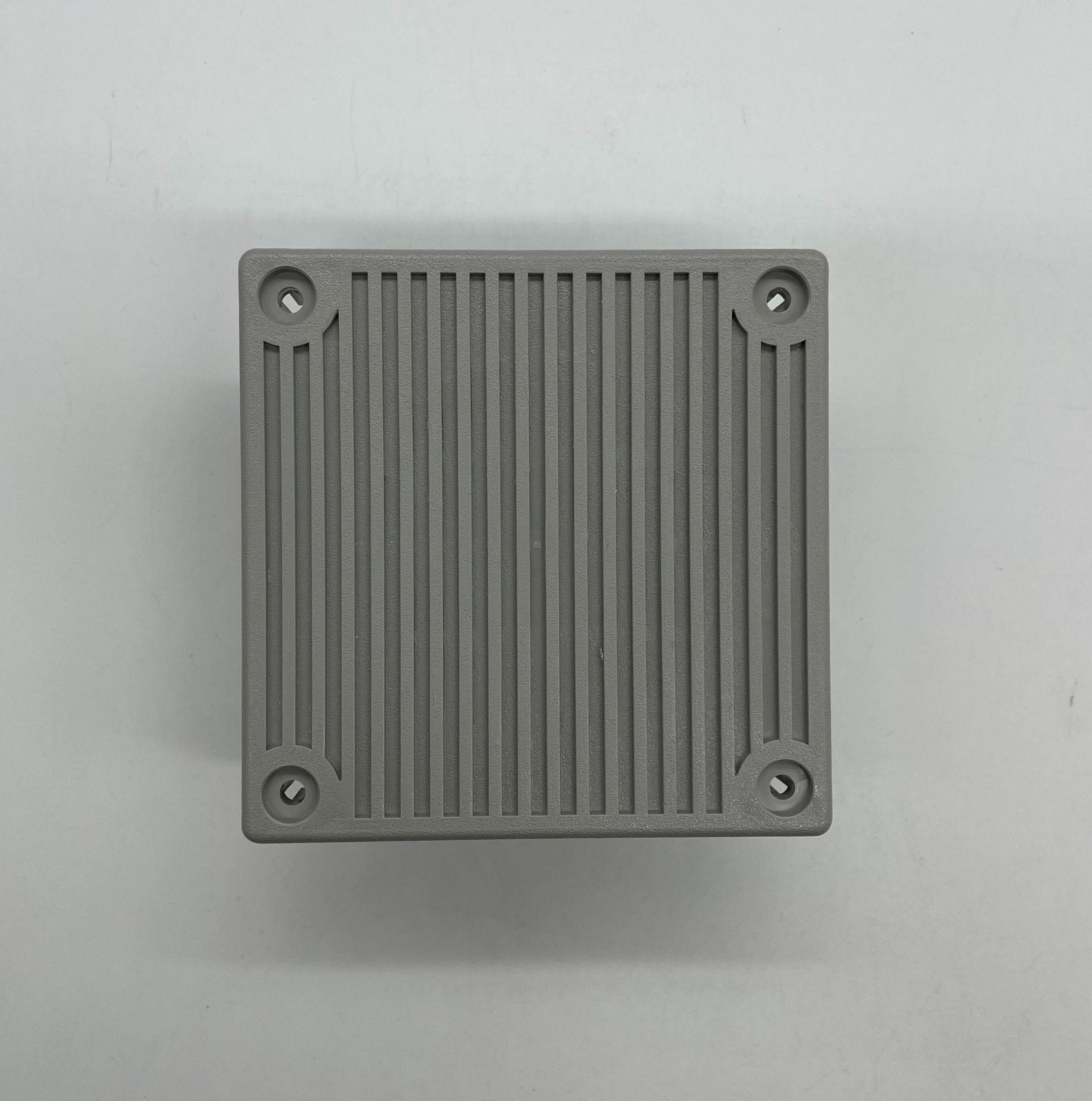 Eaton Wheelock MT4-115-S fire alarm device with emergency sound and strobe light mounted on a wall.