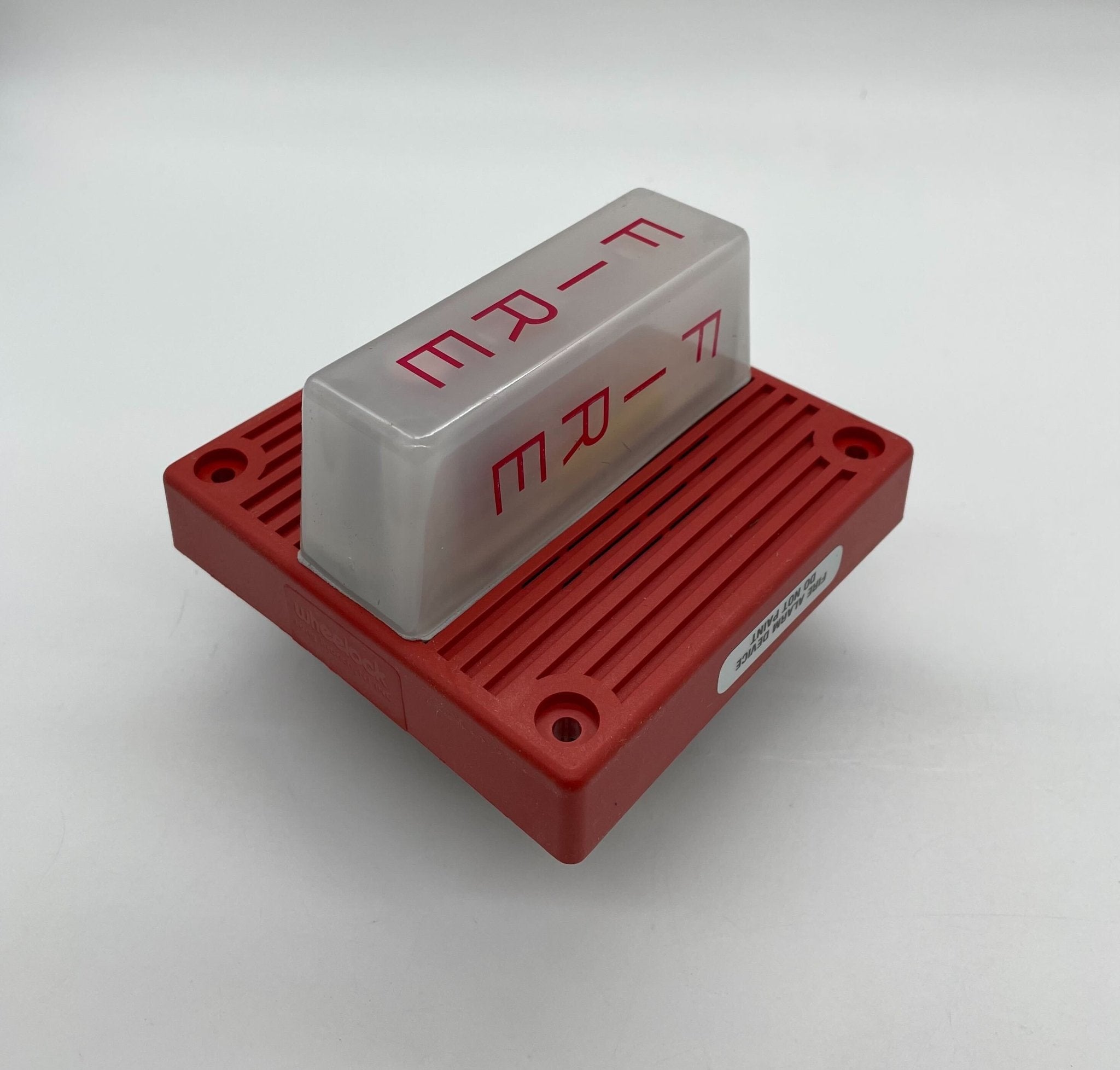 Eaton Wheelock MT4-115-WH-VFR strobe light mounted on a ceiling, providing high-visibility emergency signaling.