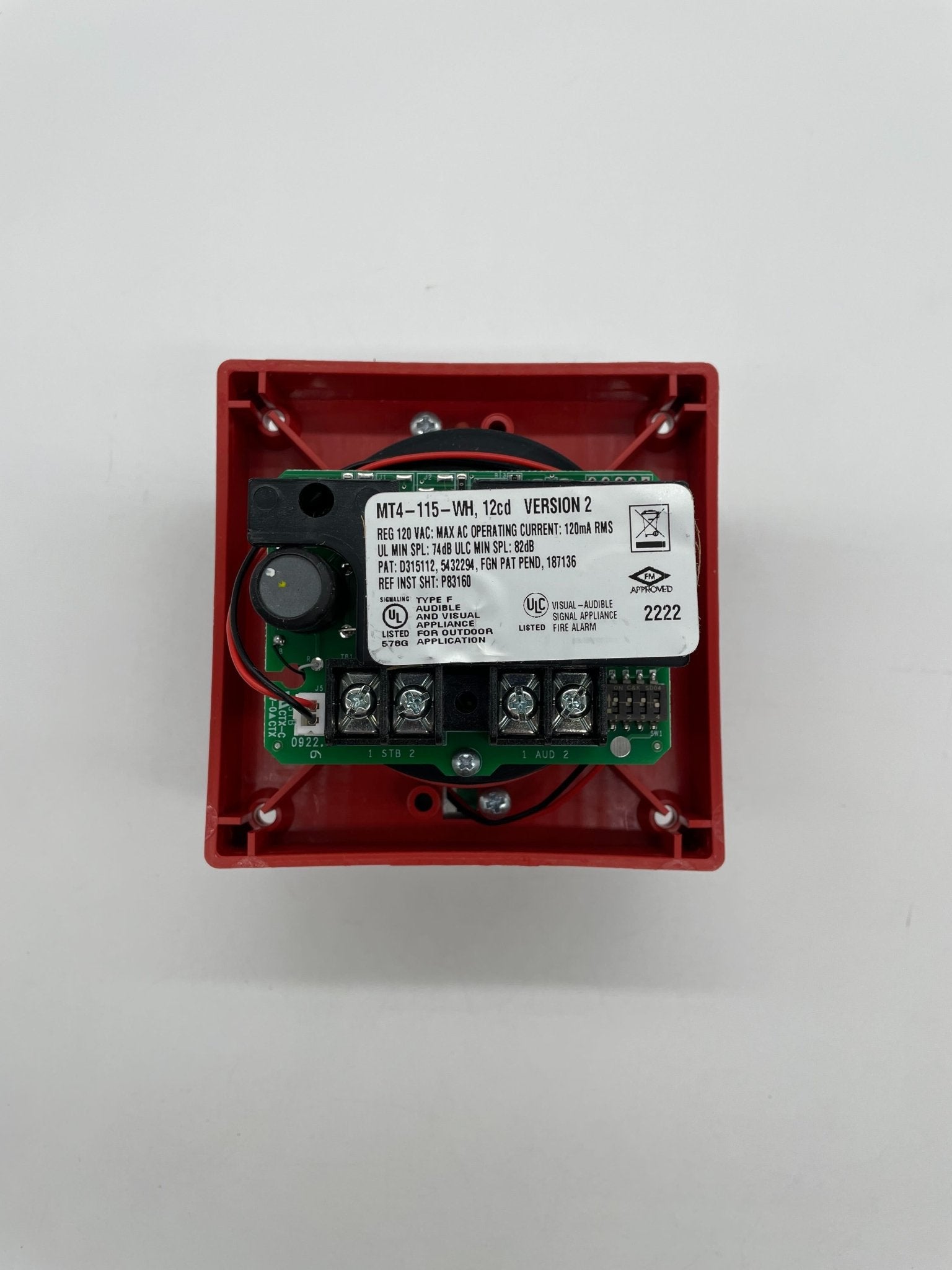 Eaton Wheelock MT4-115-WH-VFR strobe light mounted on a ceiling, white housing with clear lens for emergency signaling.