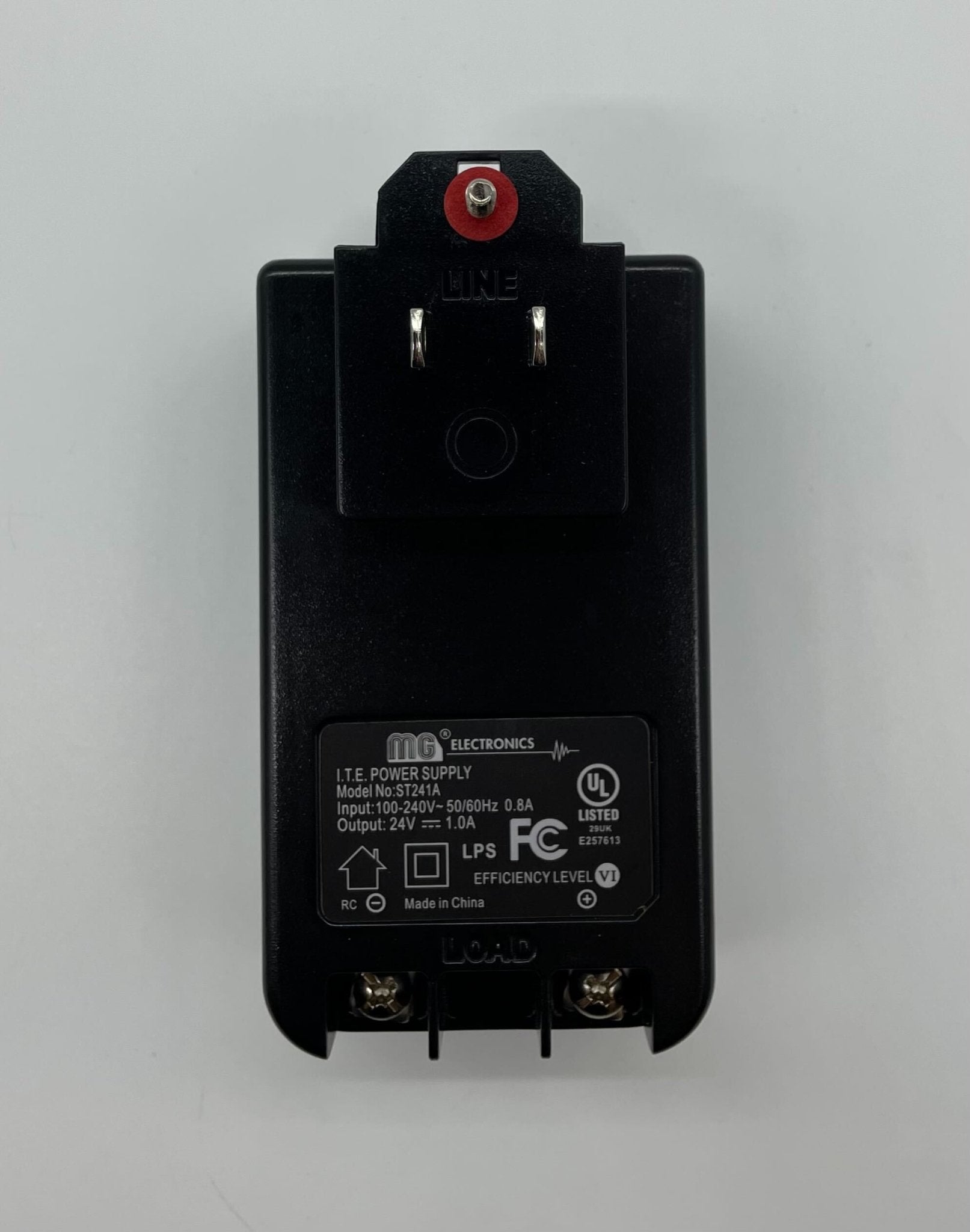 Eaton Wheelock RPS-2406 power supply unit with multiple output connectors, shown in a close-up view.