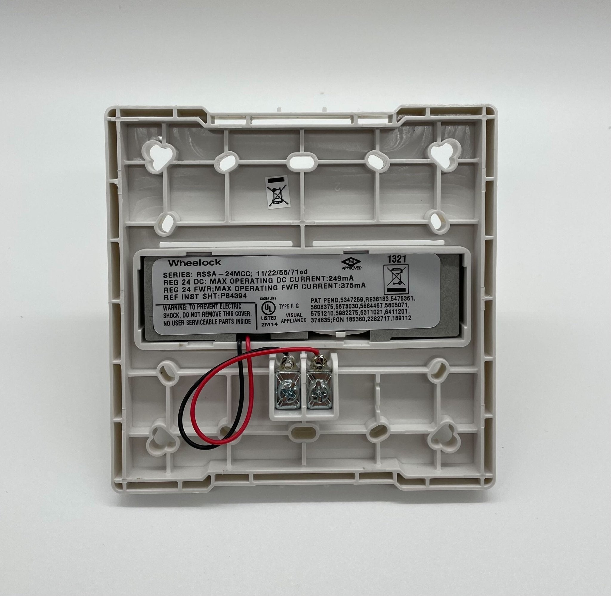 Eaton Wheelock RSSA-24MCC-NW strobe light with white lens, mounted on a wall for emergency signaling and alerting.