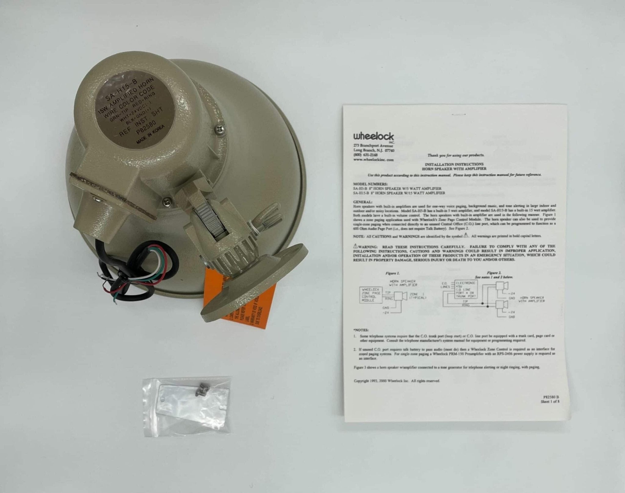 Eaton Wheelock SA-H15-B horn with black finish, mounted on a white background, showcasing its compact design and mounting bracket.