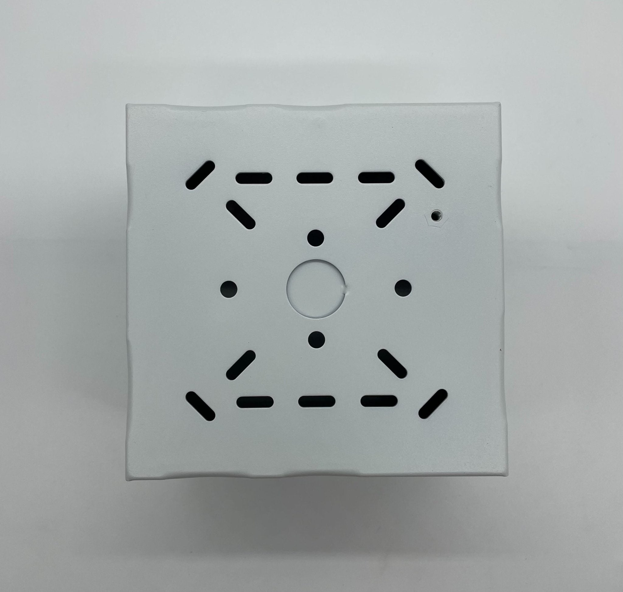 Eaton Wheelock SBB-W backbox mounted on a wall, designed for electrical wiring and device installation.