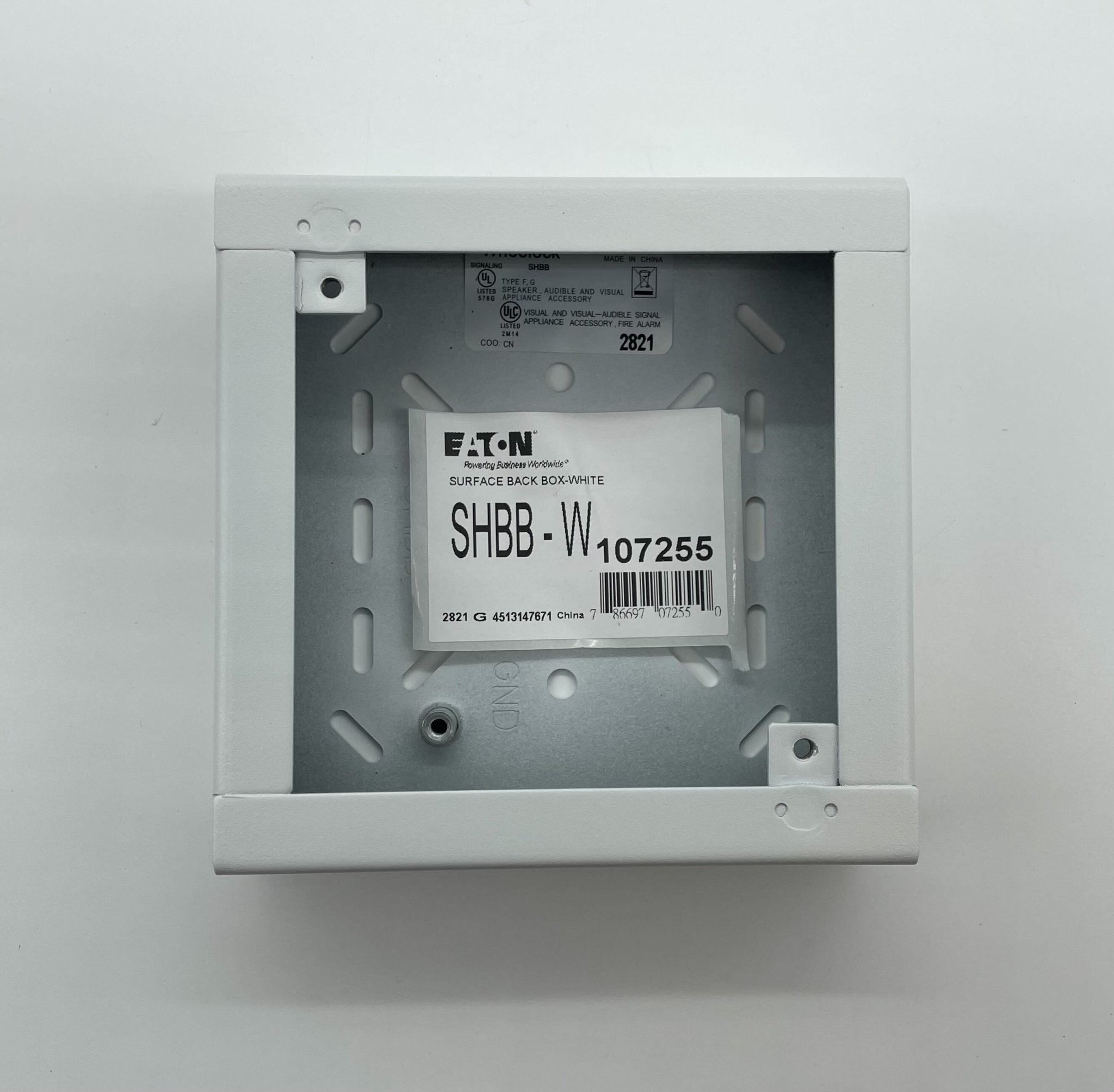 Eaton Wheelock SHBB-W backbox, metal electrical enclosure with knockout openings for wiring.