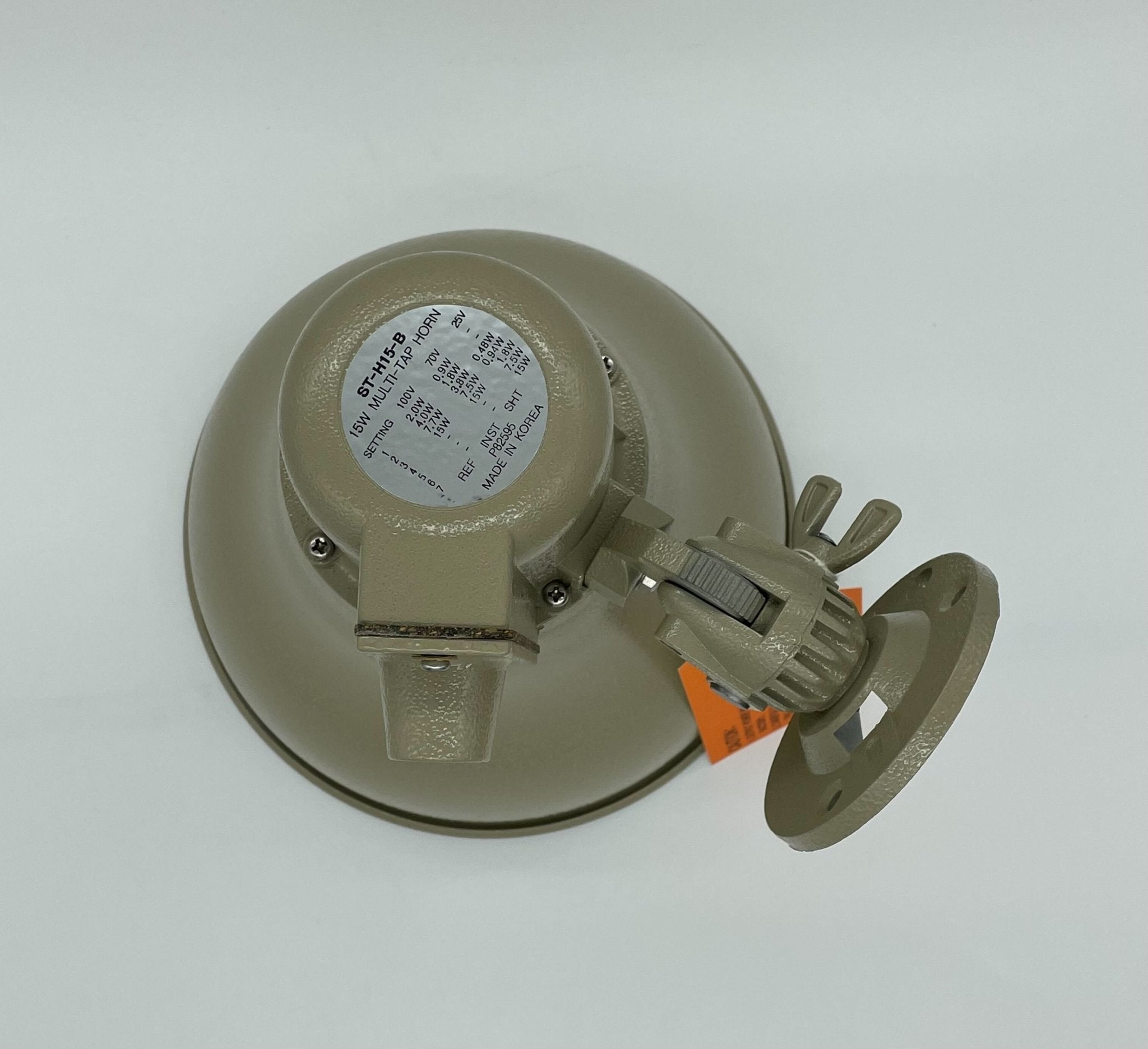Eaton Wheelock ST-H15-B fire alarm horn/strobe with red housing and mounting base, designed for fire safety systems.
