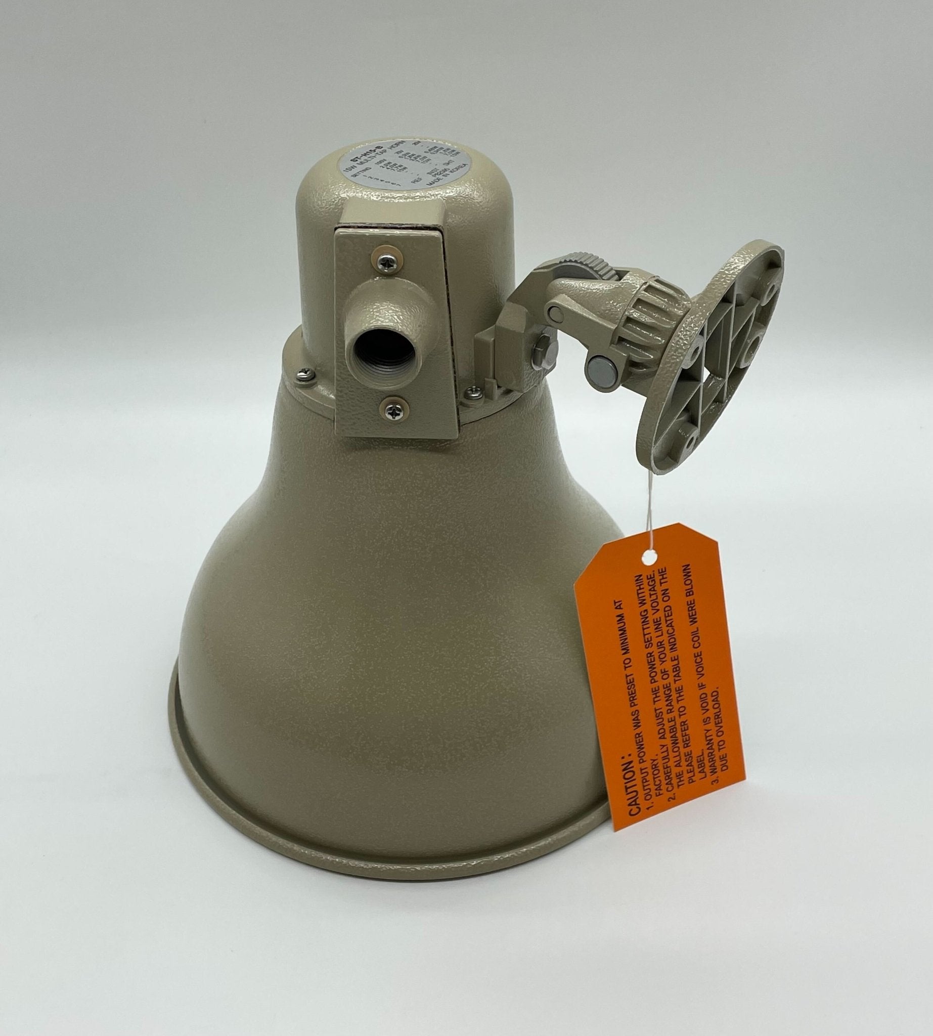 Eaton Wheelock ST-H15-B fire alarm horn strobe with red housing and mounting base, designed for emergency signaling.