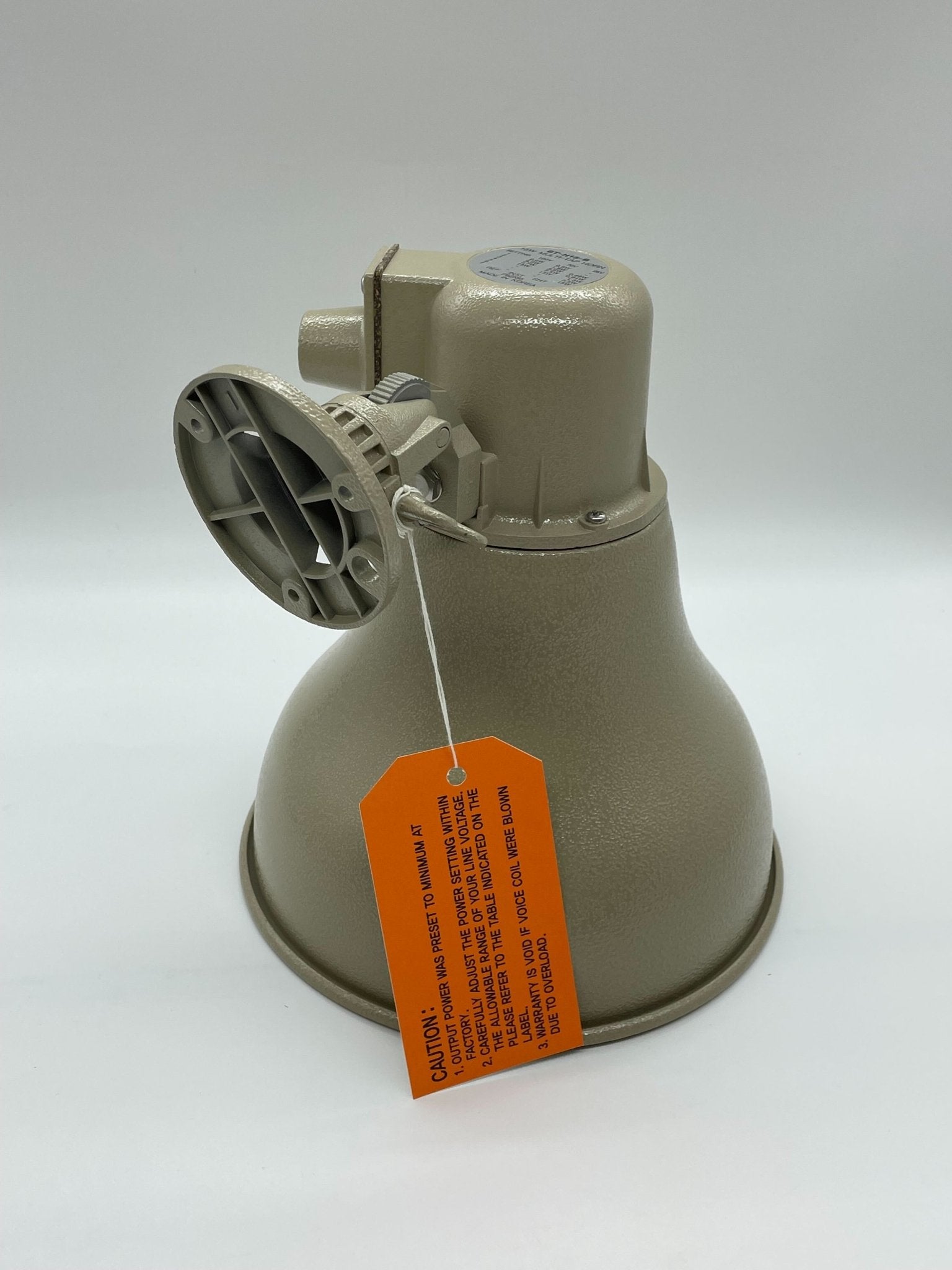 Eaton Wheelock ST-H15-B fire alarm with red and black wiring, mounted on a white wall, designed for building safety.