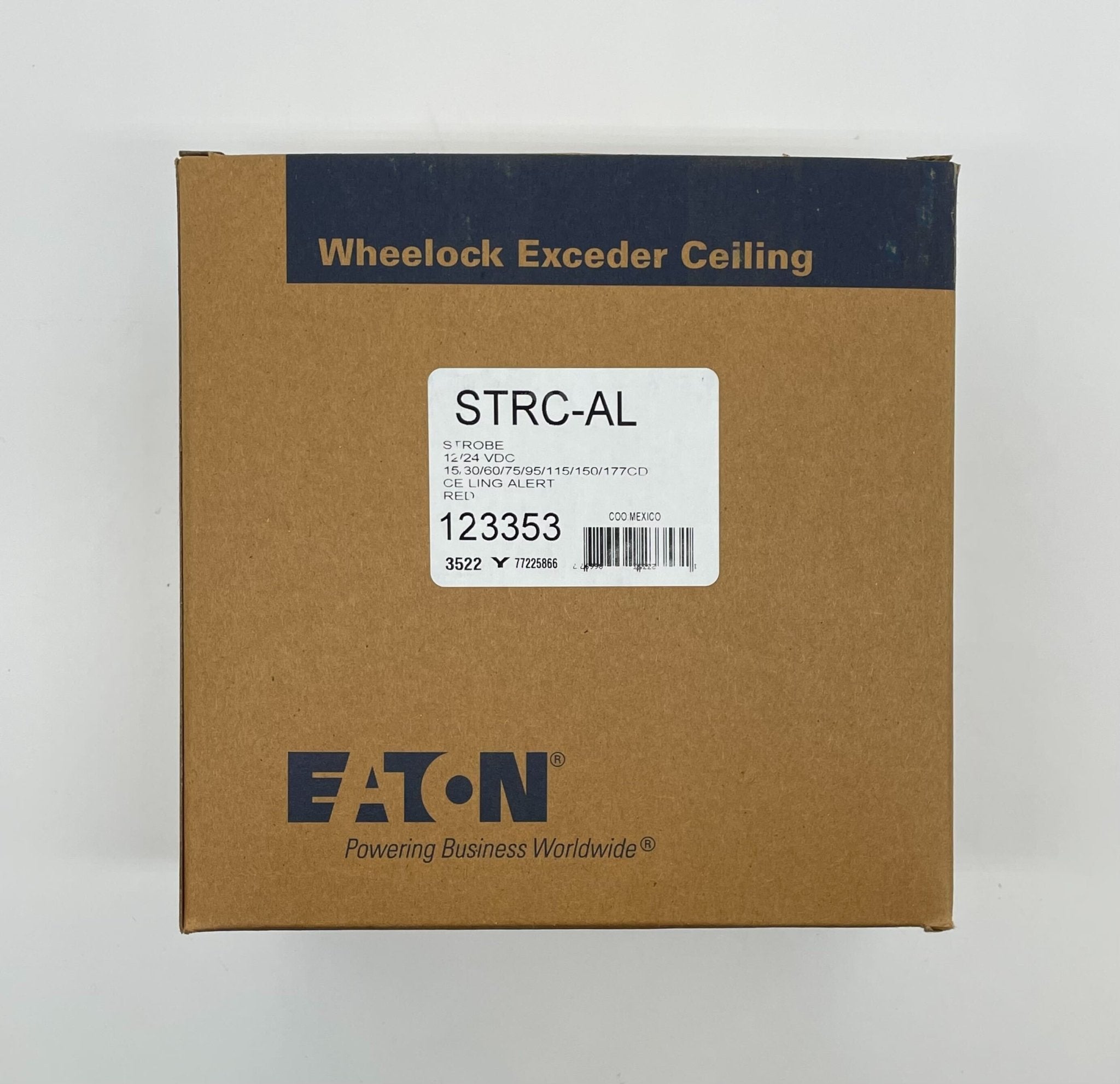 Eaton Wheelock STRC-AL strobe light with aluminum housing, mounted on a wall for emergency signaling and alerting.