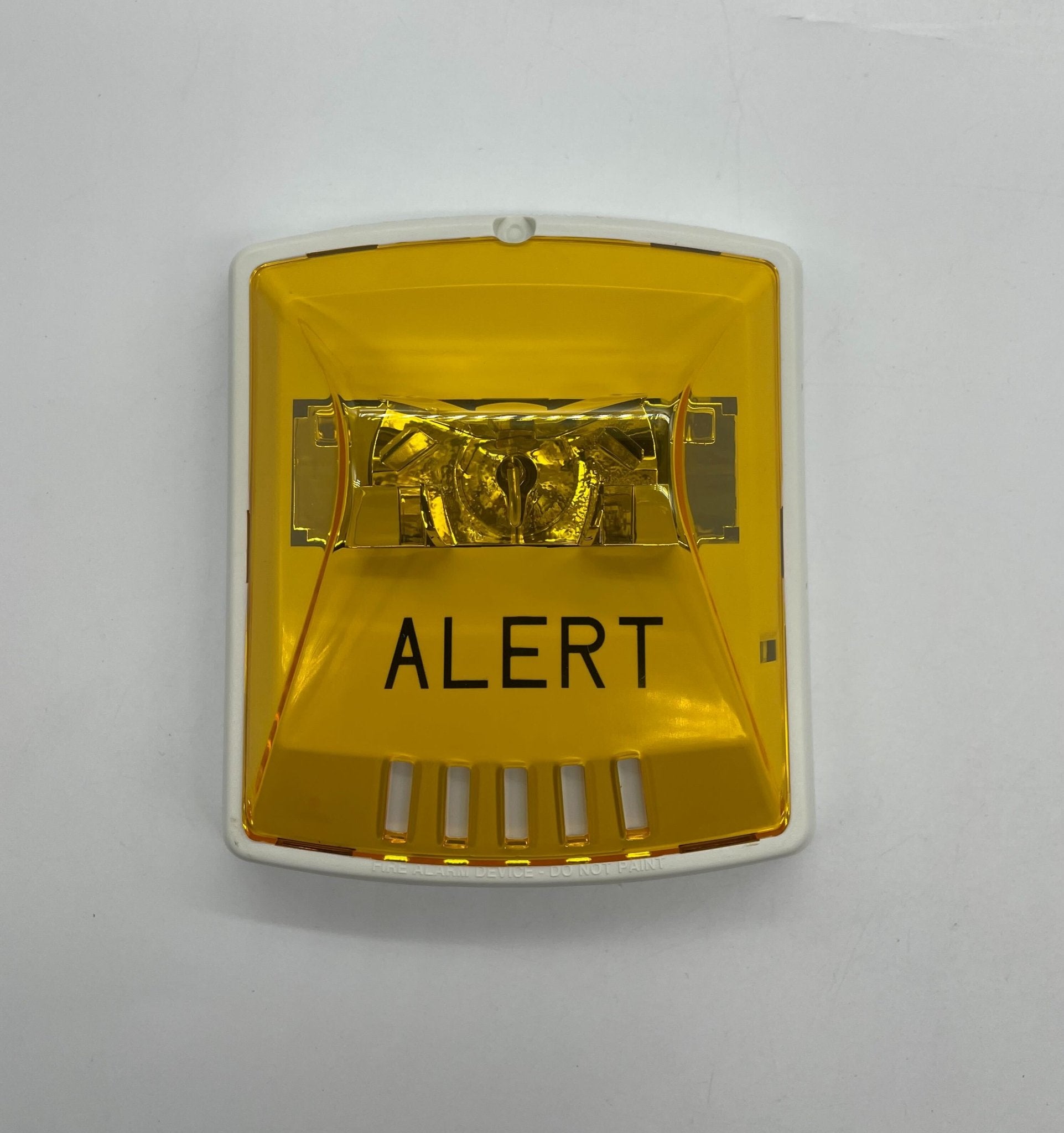 Eaton Wheelock STW-ALA strobe light with lens and mounting bracket, designed for emergency and warning signaling.