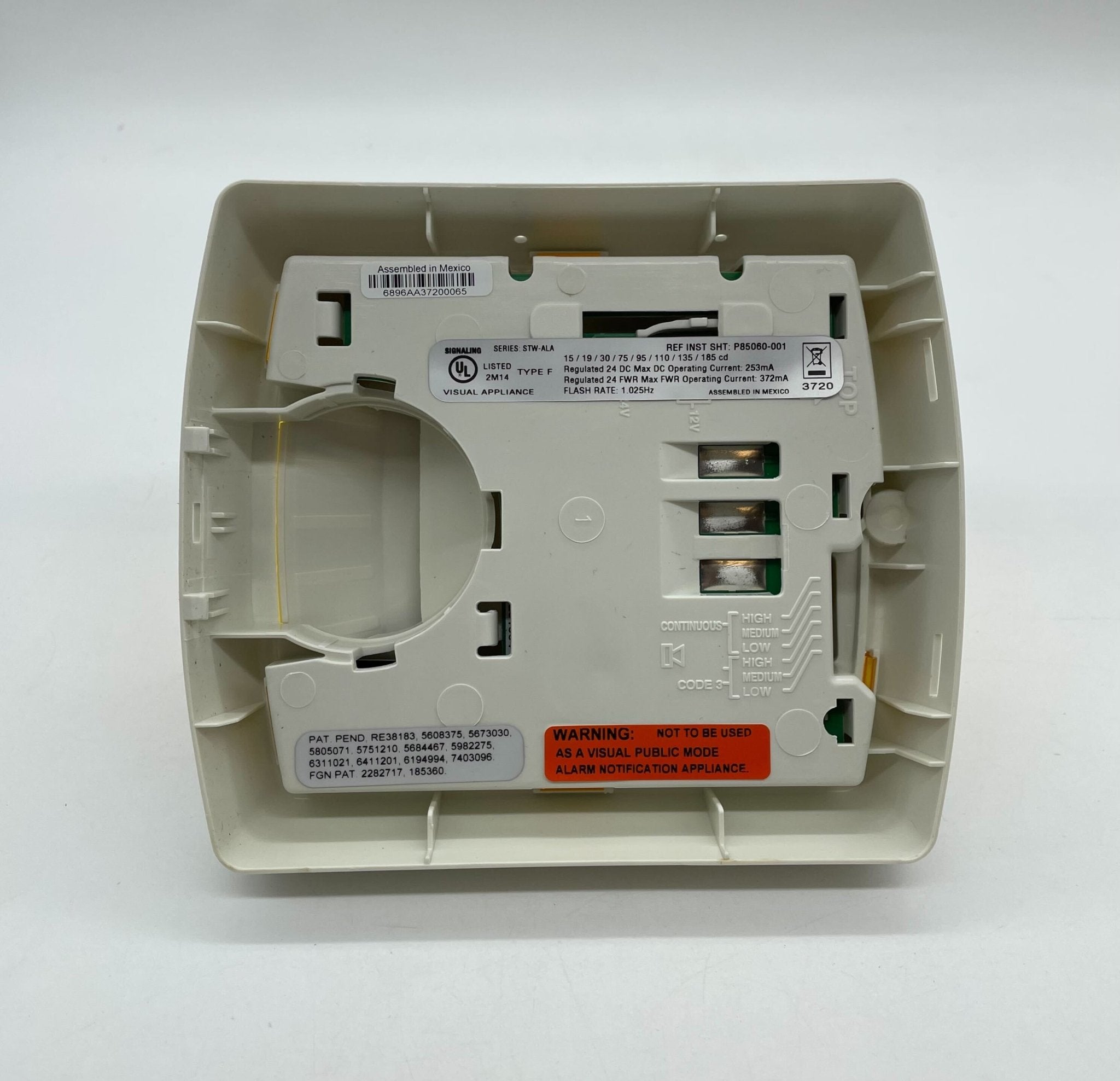 Eaton Wheelock STW-ALA strobe light with clear lens and mounting base, designed for emergency signaling and alert systems.