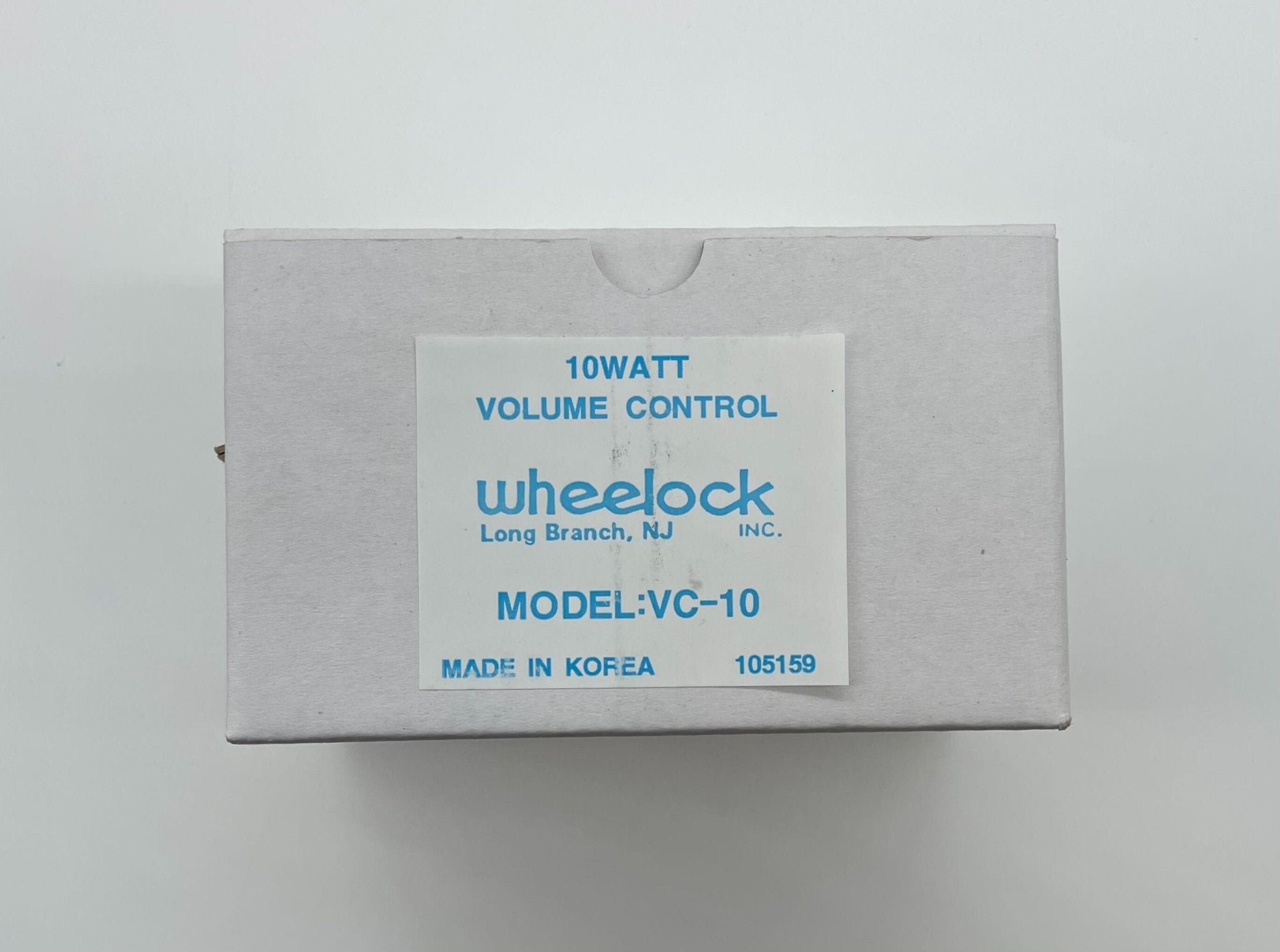 Eaton Wheelock VC-10 fire alarm horn and strobe light for fire safety systems, mounted on a wall.