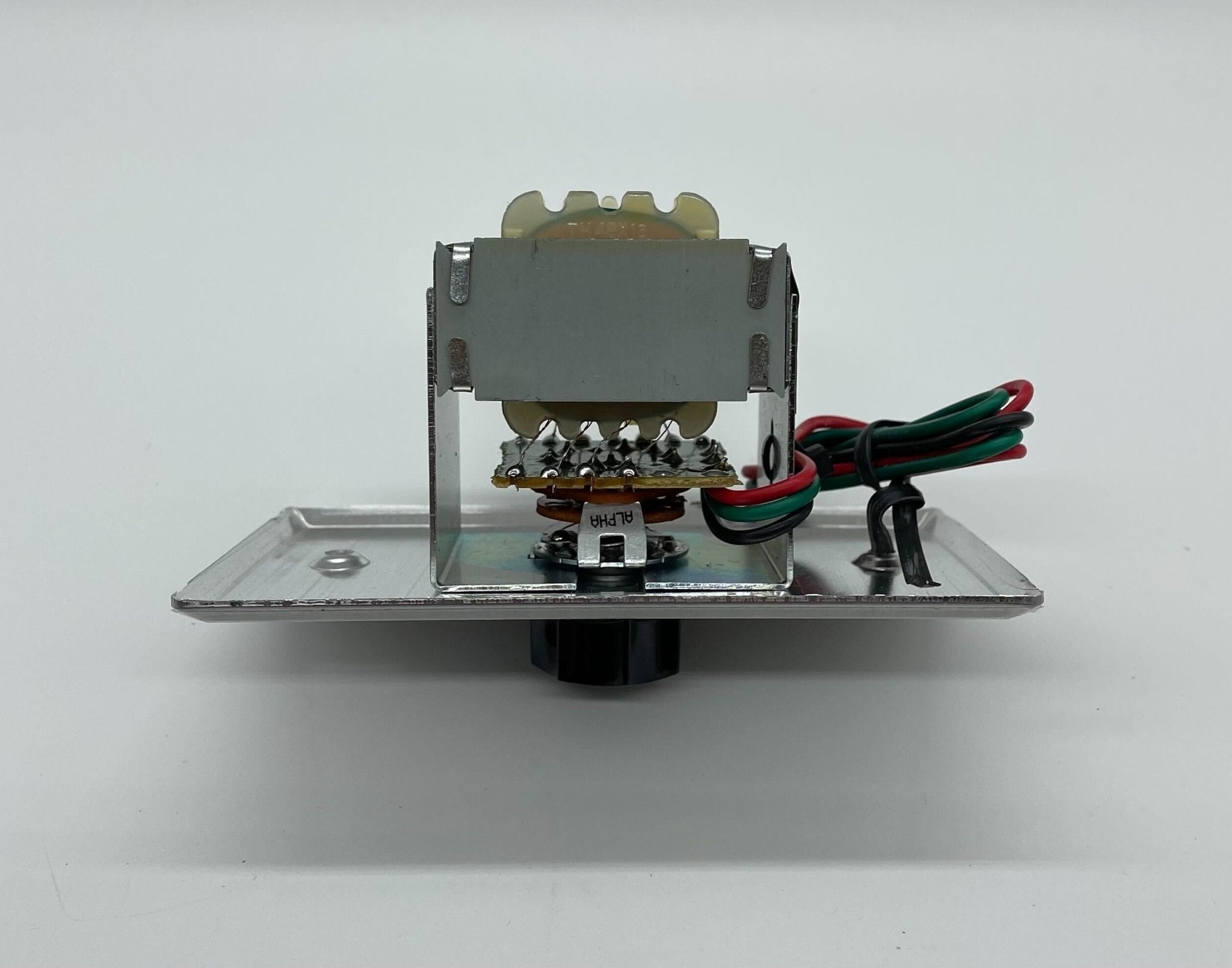 Eaton Wheelock VC-10 fire alarm horn strobe with red housing and mounting bracket, designed for emergency alert systems.