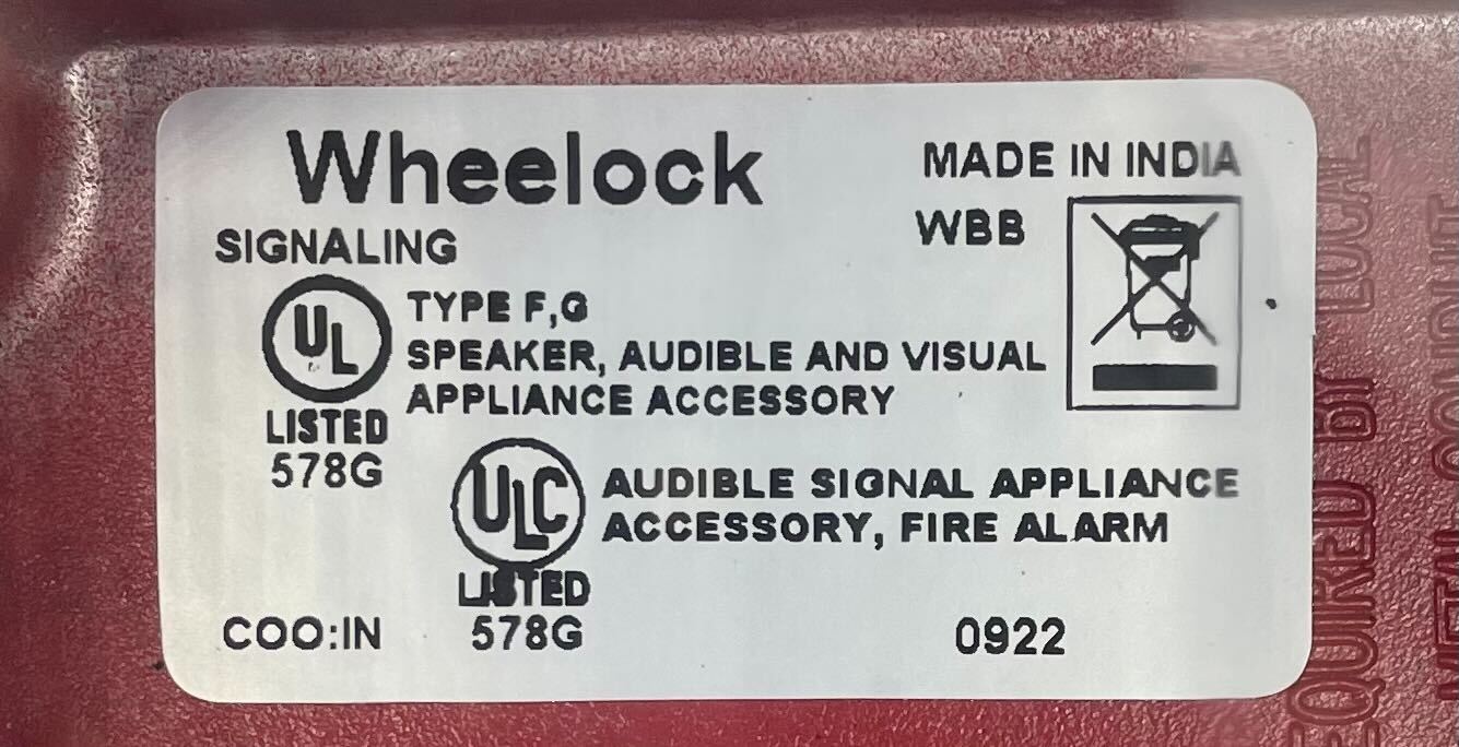 Eaton Wheelock WBB-R backbox for electrical systems, shown in a clean, metal enclosure with mounting features.