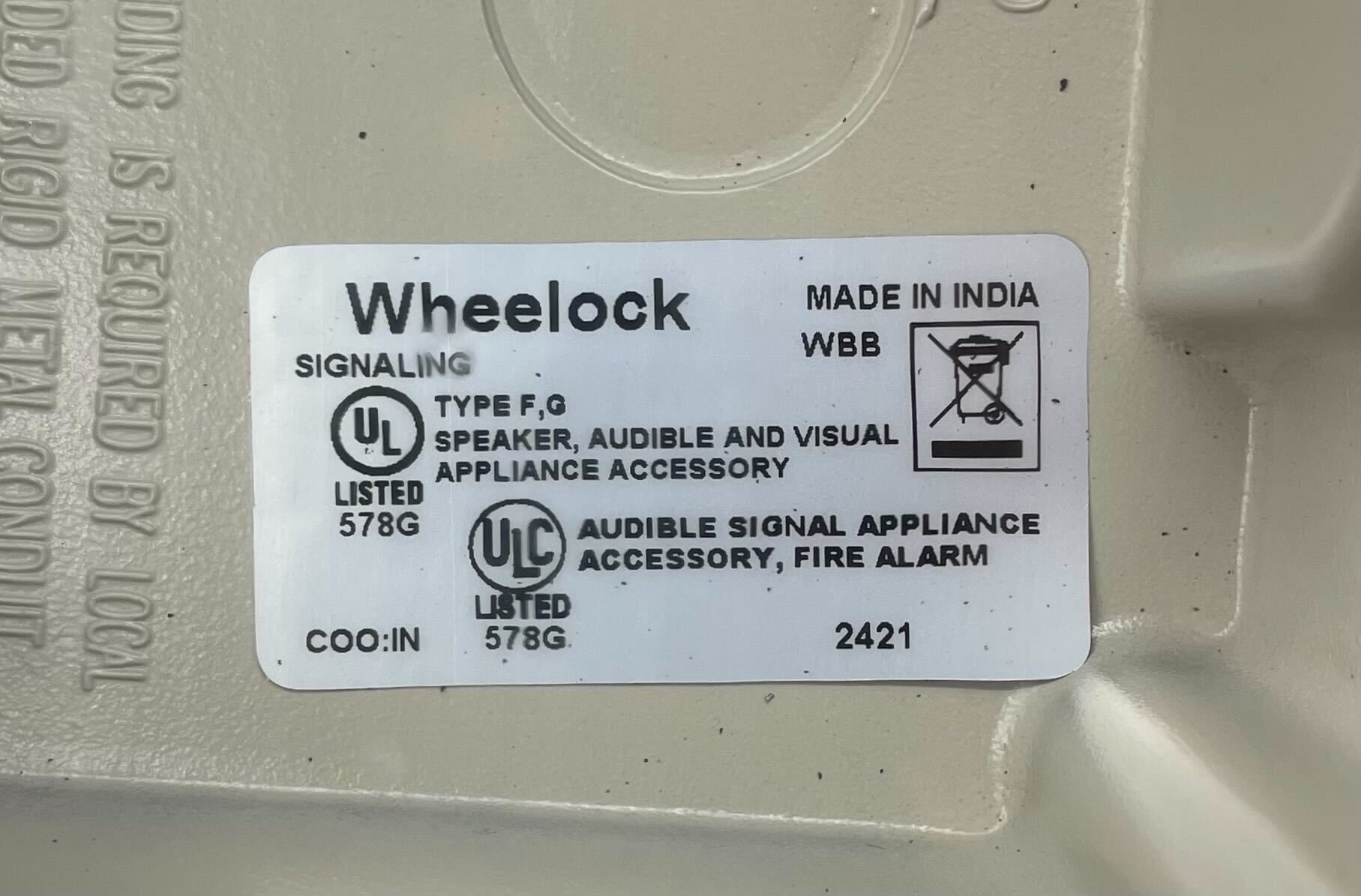 Eaton Wheelock WBB-S backbox mounted on a wall, designed for electrical wiring and device installation.