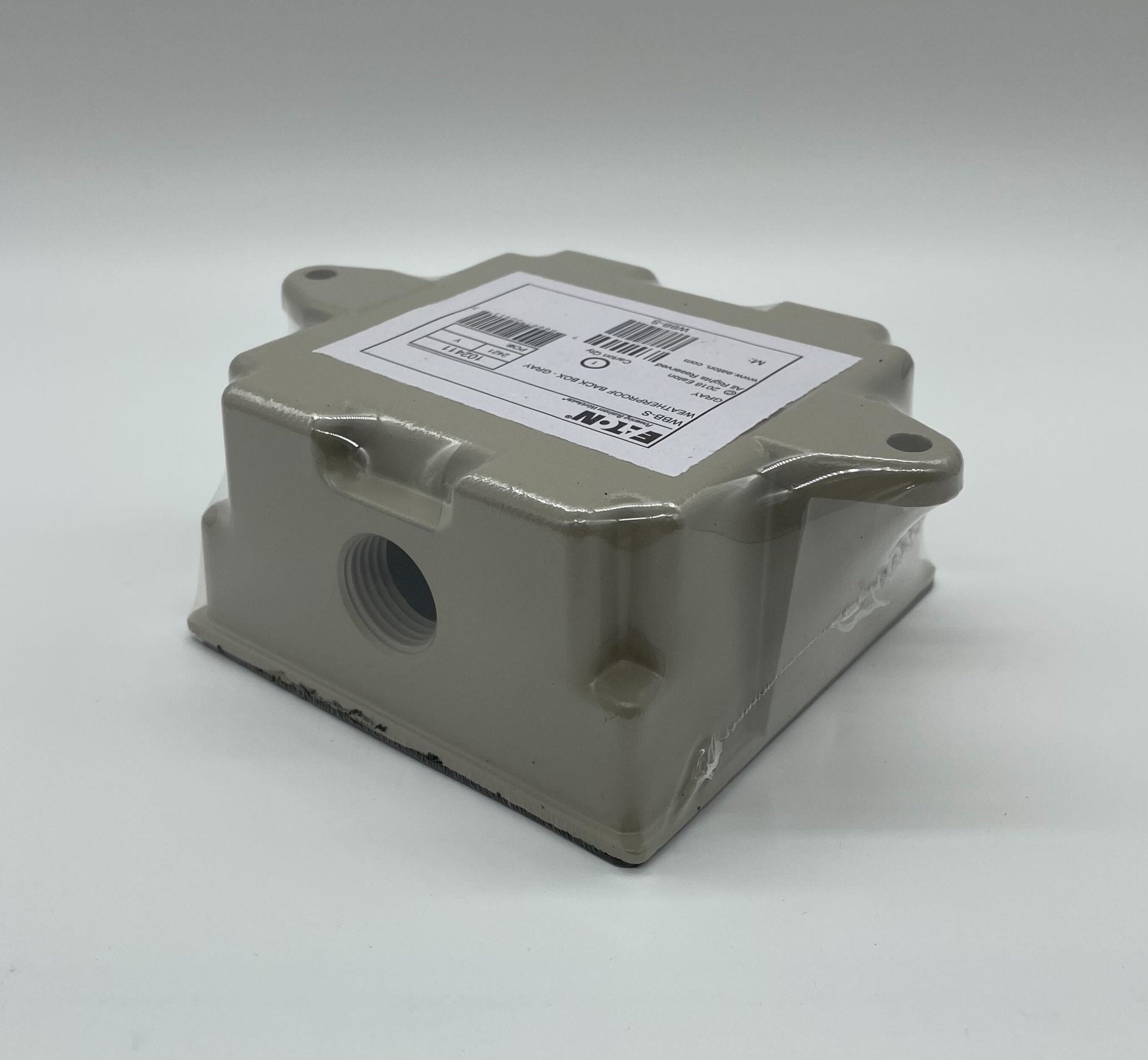 Eaton Wheelock WBB-S backbox for electrical systems, shown with mounting details and brand labeling.
