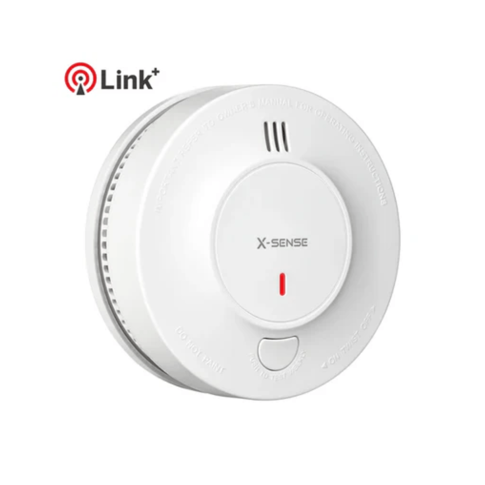 X-Sense SD19-W fire alarm sensor with ULC certification, mounted on ceiling for smoke detection.